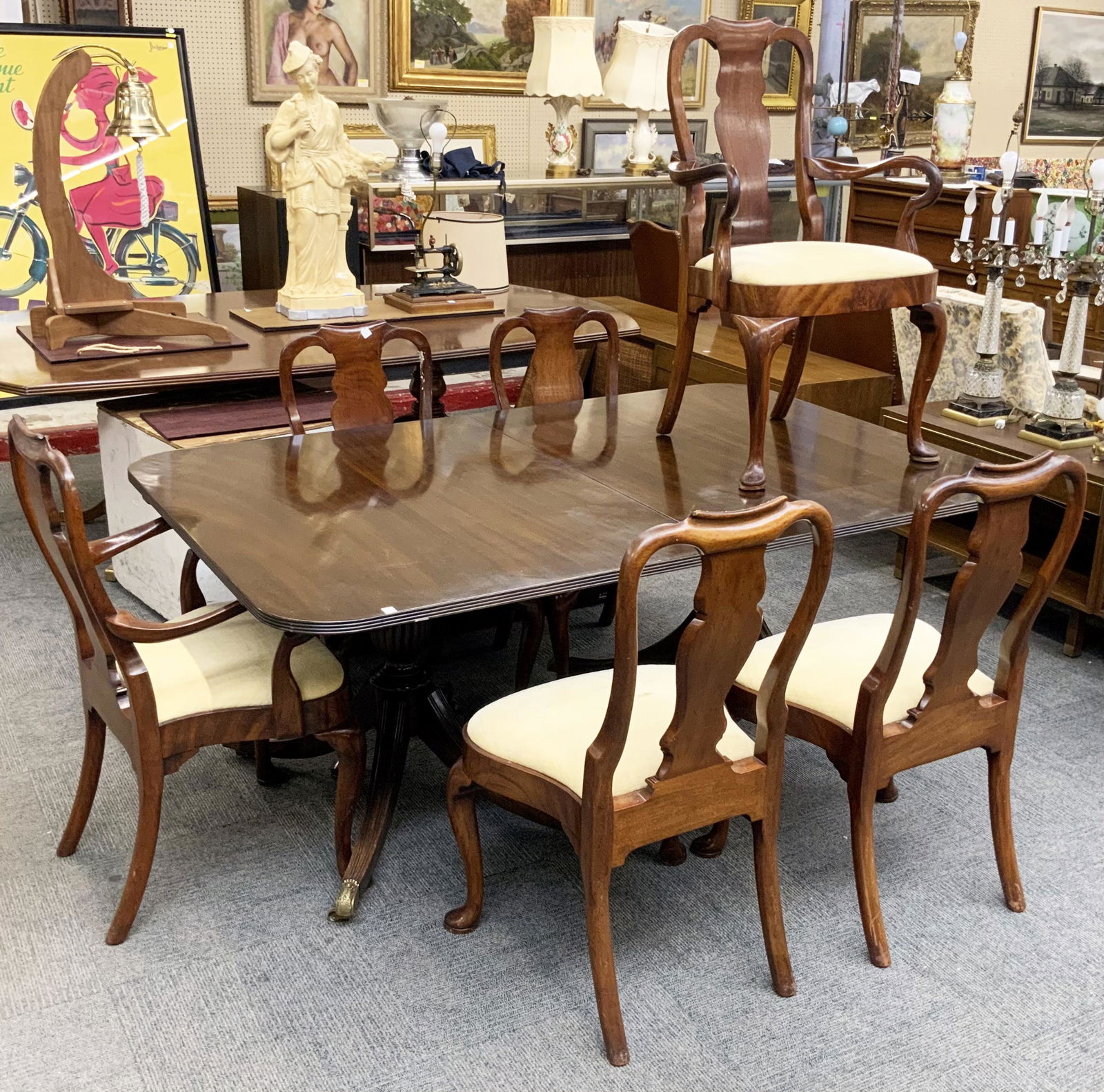 Mahogany Duncan Phyfe Table with 6 Chairs.: The Chairs are Queen Anne Style. The Chairs do not Seem to Match the Table Exactly. The Table can be Separated into 2 Tables, each with its Own Pedestal. The Chairs have some Scratches, Gunk and Stick