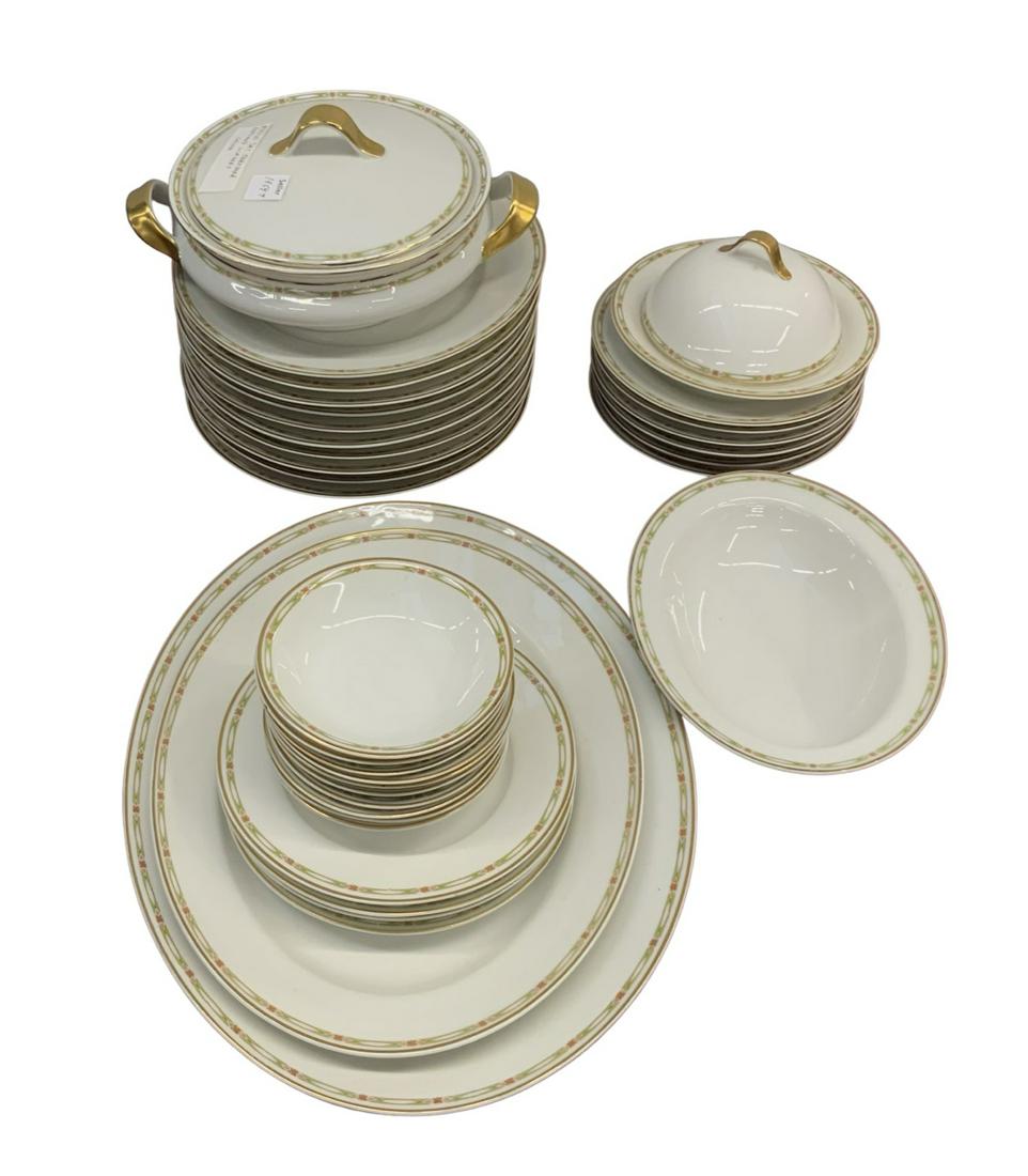 Partial Set of Theodore Haviland Limoges China.: In Overall Good Condition. Consists of a Covered Serving Dish, Open Serving Bowl, Cheese or Butter Dish with Cover, 10 Dinner Plates, 2 Oval Platters with Gravy Collector Areas (13 1/2" and 15 1/2" Wi
