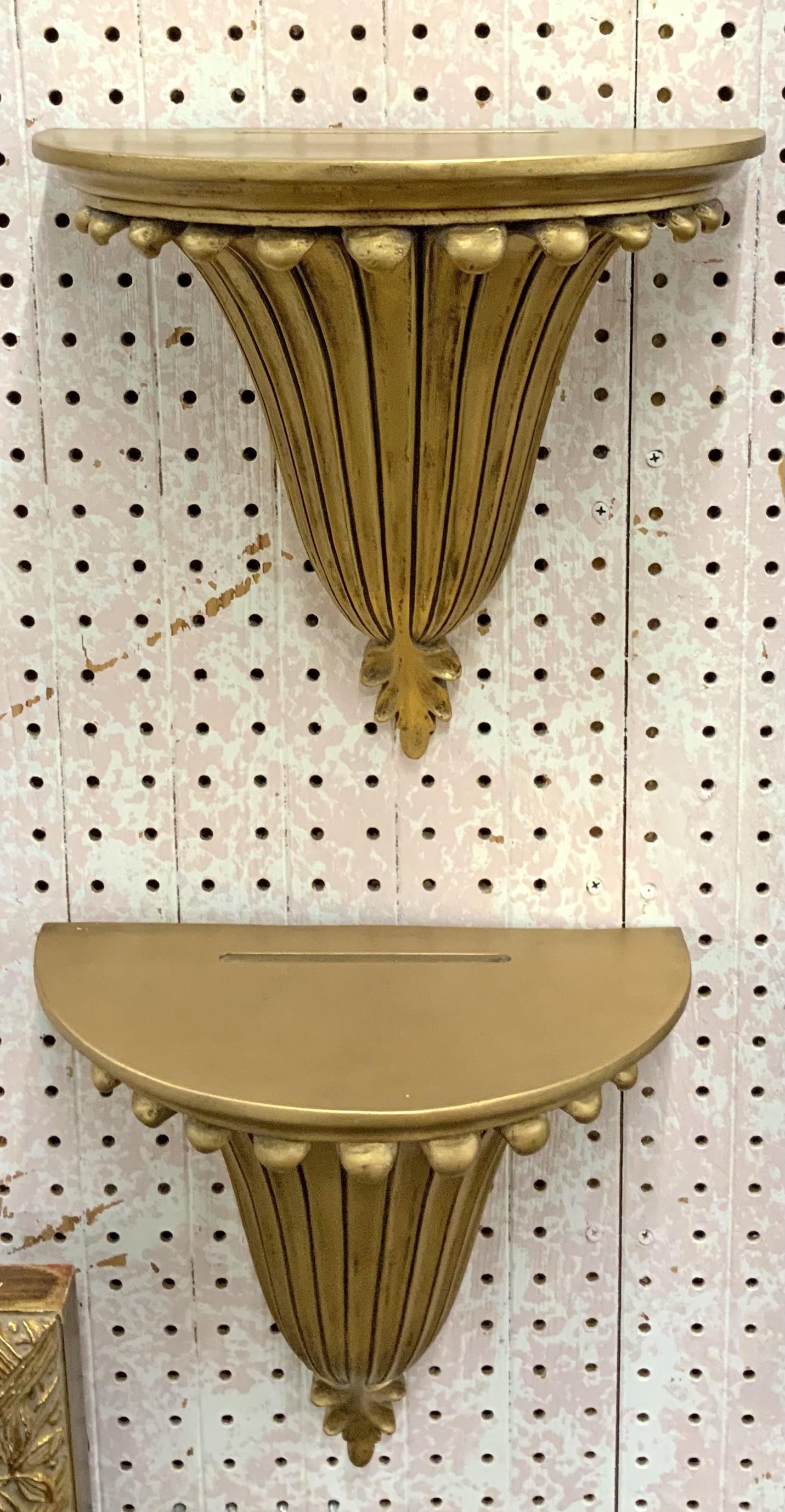 Pair of Gold-Painted Wall Shelves & Stool.: The Wall Brackets Measure 11" Tall, 11 1/2" Wide, and 6 1/4" Deep. The Footstool has a Needlepoint Top. Third-Party Shipping or Personal Pickup Required.