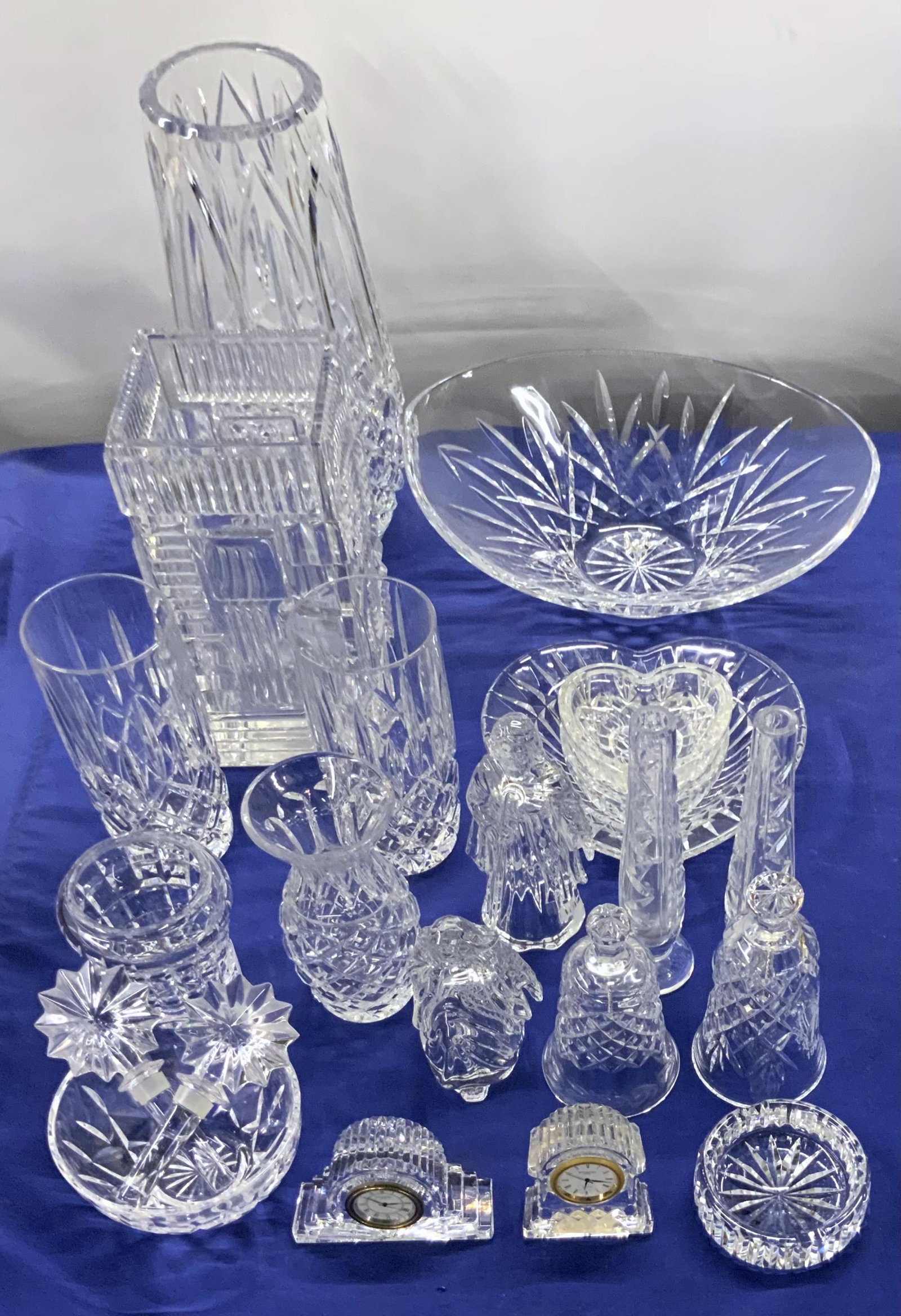Lot of Crystal Pieces, Mostly Waterford.: 21 items total. A few pieces are either unmarked or have had their mark ebbed away. Very nice condition overall. A few pieces have tiny nicks, hard to notice. The tallest piece is 10.5". Third-Party S