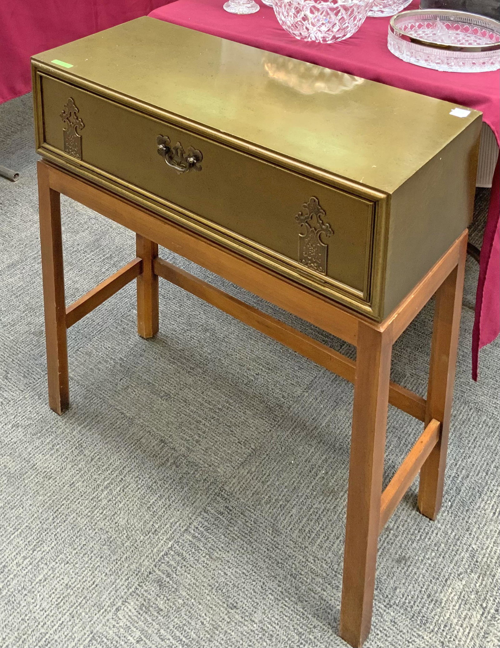 Gold-Colored Small Cabinet with Drop Front.: With a Label from the Fine Arts Furniture Company. The Cabinet Measures 30 1/4" Tall, 28" Wide, and 12" Deep. It has a Few Scratches on the Top. Third-Party Freight Shipping or Personal Pickup Require