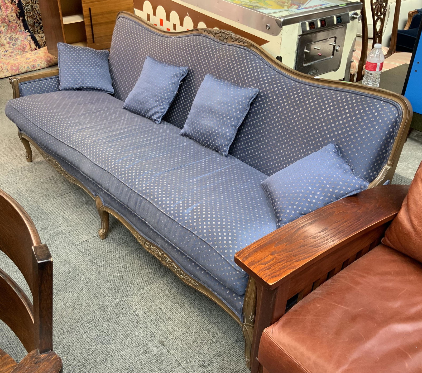 French-Style Carved Sofa.: With Blue and Gold Upholstery. The Sofa Measures 79" Wide, 30" Deep, and 34" Tall. Third-Party Freight Shipping or Personal Pickup Required.