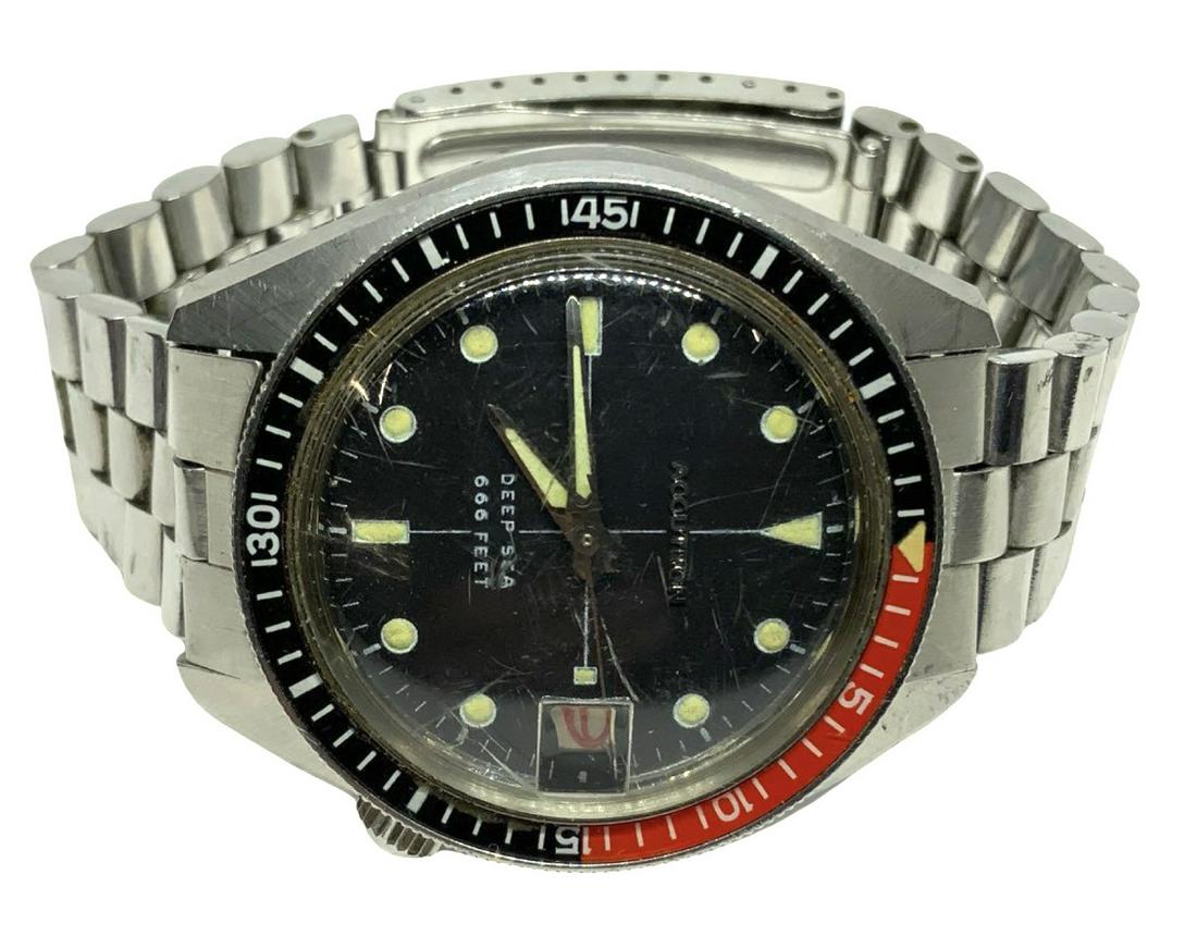 Vintage Bulova Accutron Deep Sea Diver's Watch.: The Watch is not Running. It may Need Work. It is Circa 1969. The Dial Reads, "Accutron - Deep Sea - 666 Feet". The Crystal has Many Scratches on it. The Rest of the Watch and Band have Wear, but are 