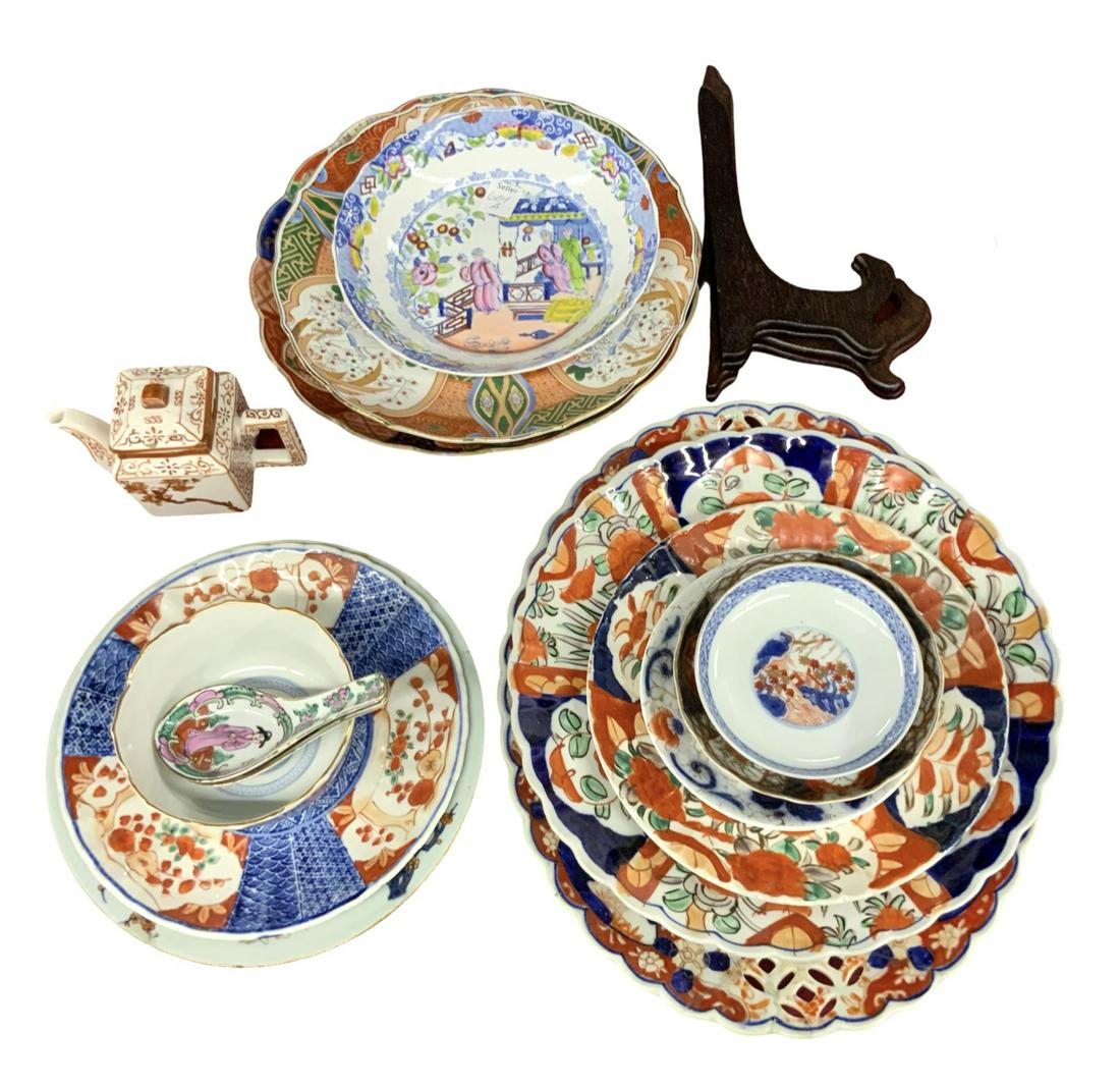 Lot of Mostly Asian Porcelain - Imari, etc.: The Large Imari Platter has been Repaired. The Grey Floral Bowl has a Chip and a Crack. Everything else Seems to be in Good Condition. The Oval Japanese Imari Platter Measures 13" Long. Third-Party Sh