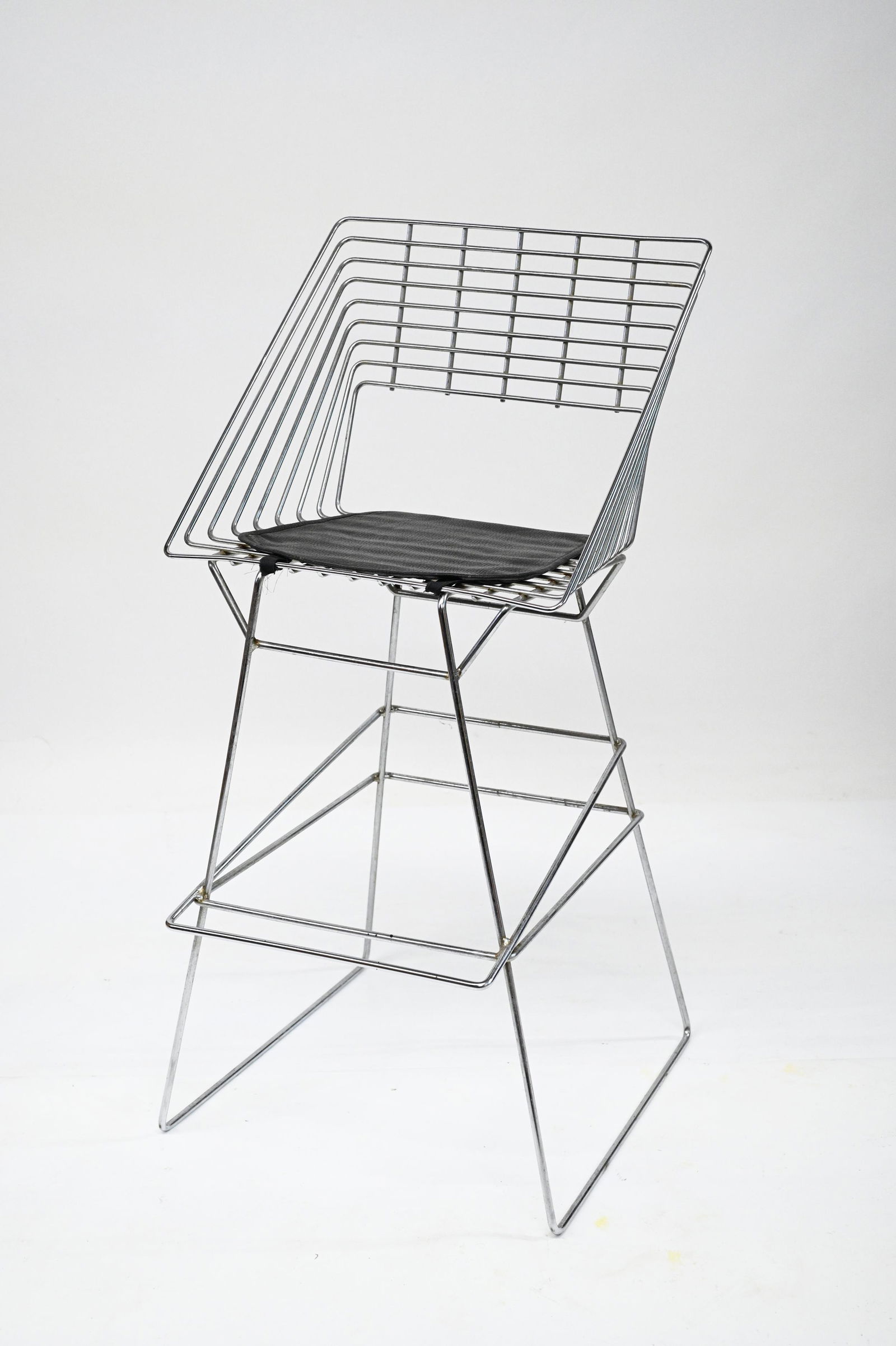 Chrome Modern Stool with Padded Leather Seat.: Measures 41 1/4" Tall, 20" Wide, and 20 1/2" Deep. Possibly a Verner Panton for Fritz Hansen Box Wire Stool. Third-Party Freight Shipping or Personal Pickup Required.