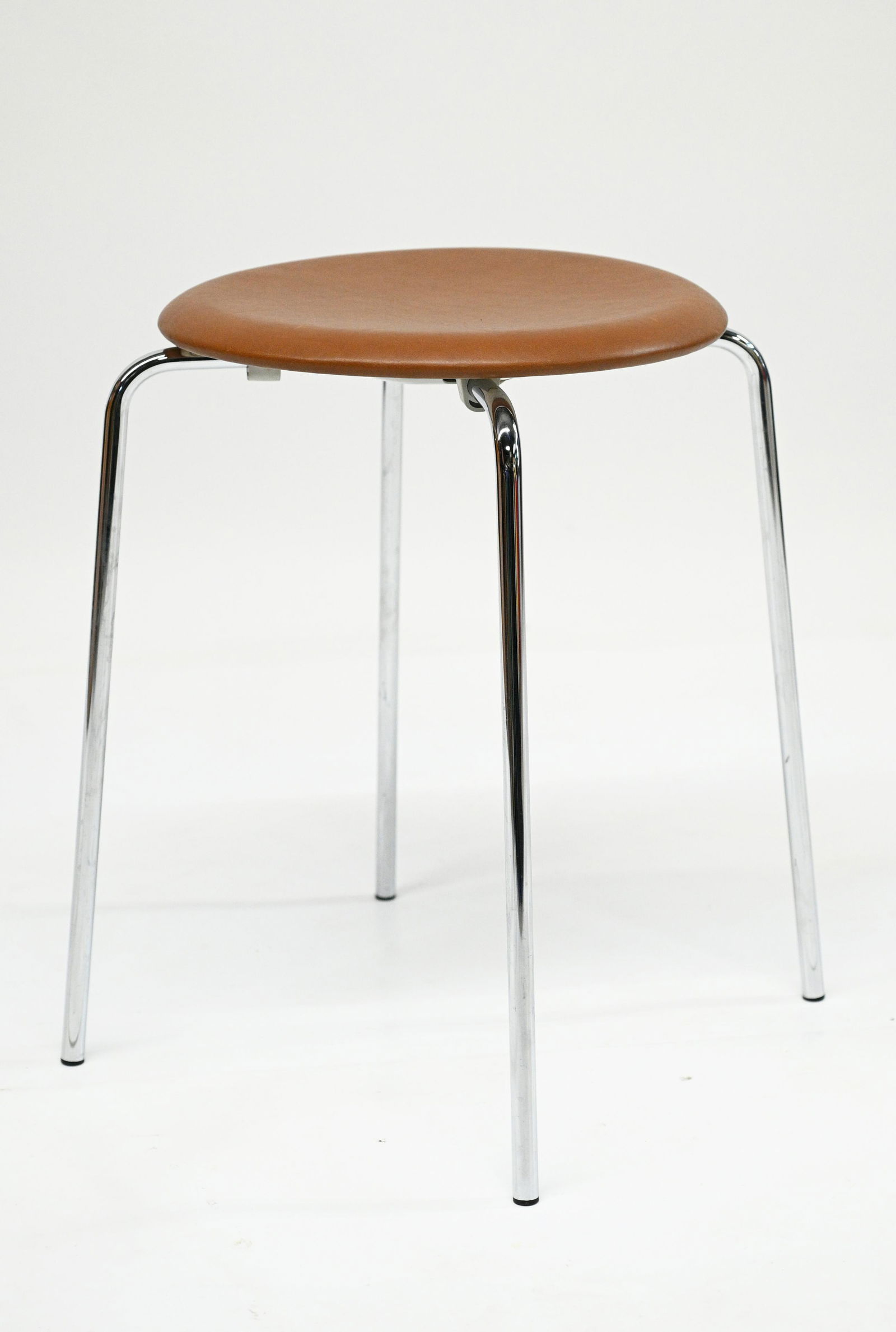 Arne Jacobsen for Republic of Fritz Hansen Stool.: A Contemporary Dot Stool, Marked Made in Denmark. Measures 18" Tall. The Top Measures 13" in Diameter. The Leather Top has a Small Scuff or Two. Third-Party Shipping or Personal Pickup Required.