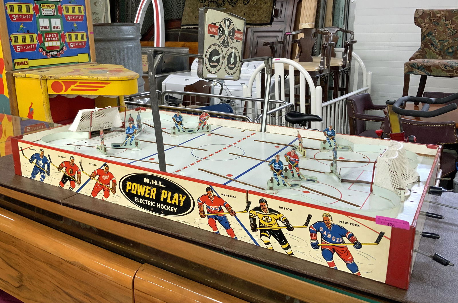 NHL Power Play Electric Hockey Table Top Game.: By Eagle Toys, Limited. Actually, there doesn't seem to be Anything Electric about it, as all the Players are Controlled by Hand. It measures 38" Long. It's in a Little Rough Condition. Third-Party Sh