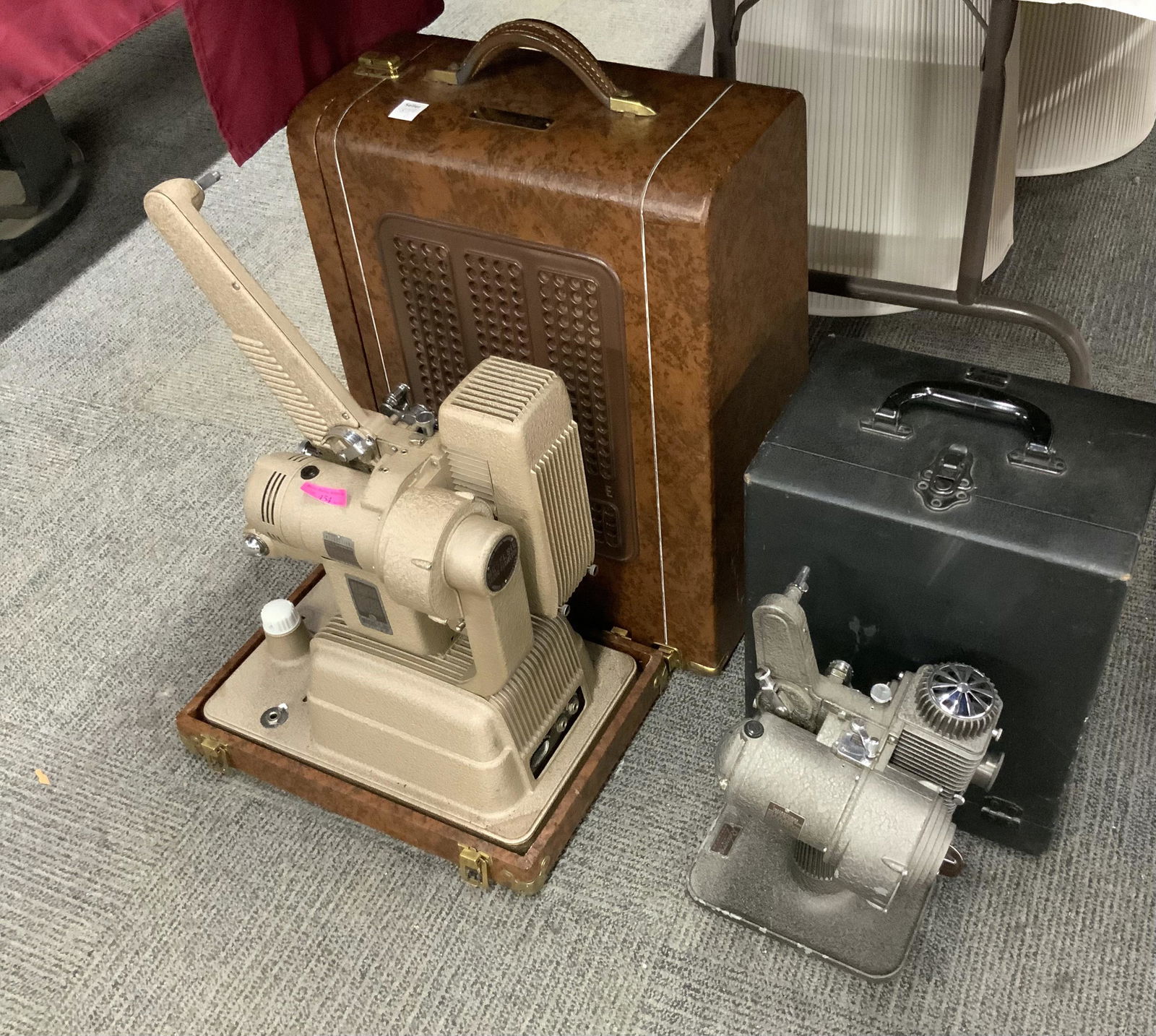 Lot of 2 Vintage Revere Film Projectors.: A Revere 16 Sound Projector and a Revere 8 Projector. Both have the Original Cases and are Untested. Third-Party Shipping or Personal Pickup Required.