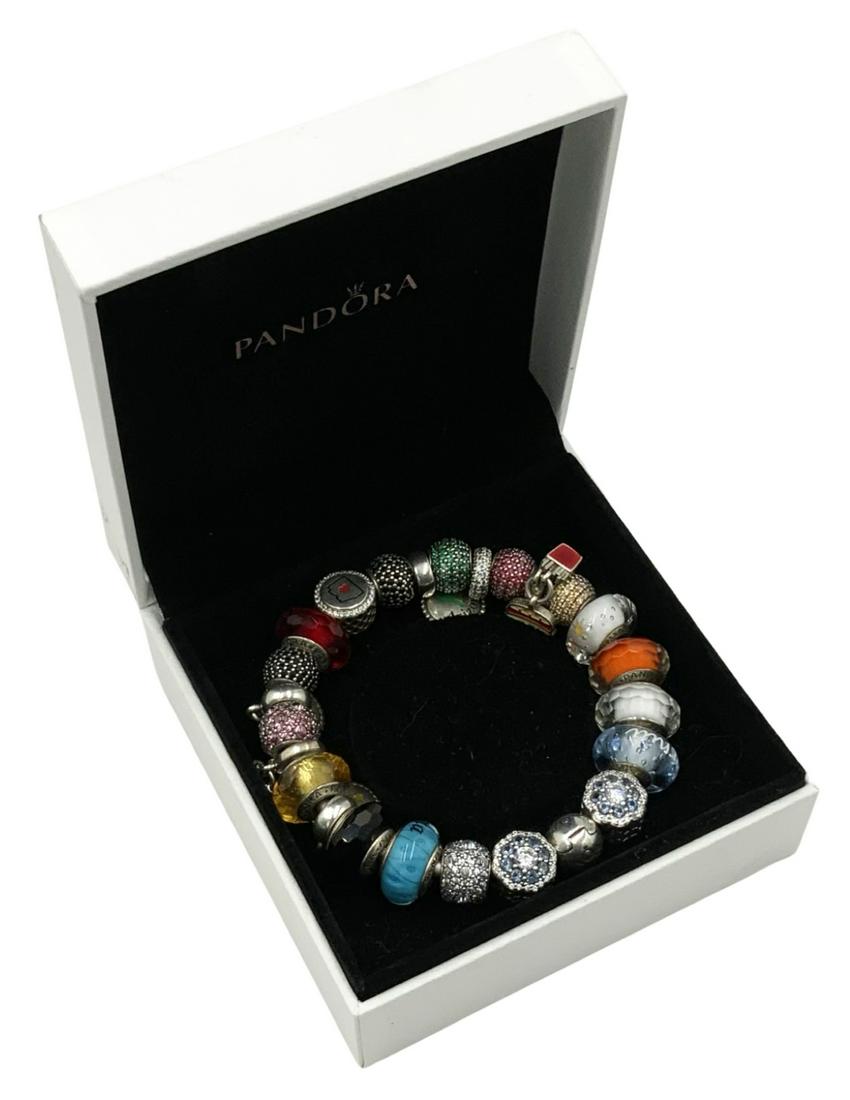 Pandora Sterling Bracelet, Loaded with Charms. (1 of 2)
