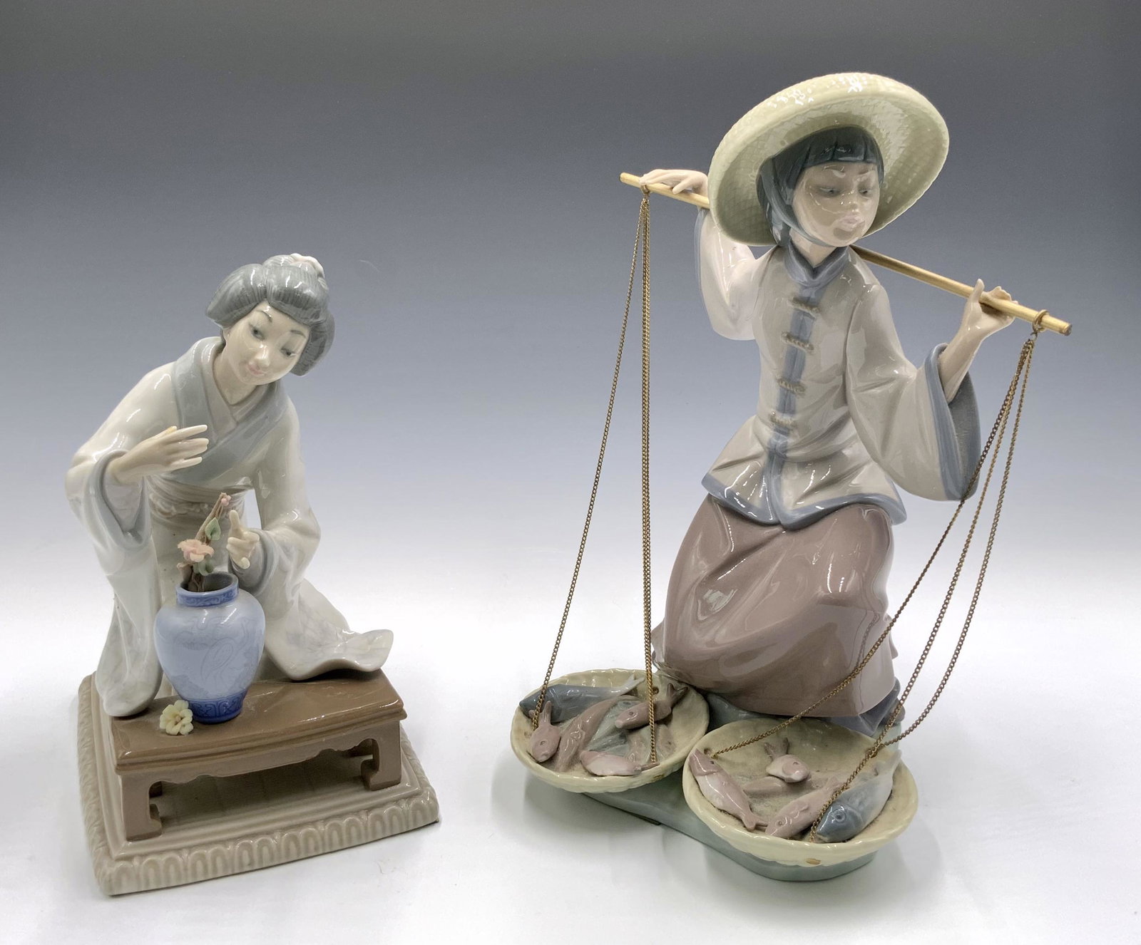 Lot: 2 Lladro Figurines of Asian Women. (1 of 3)