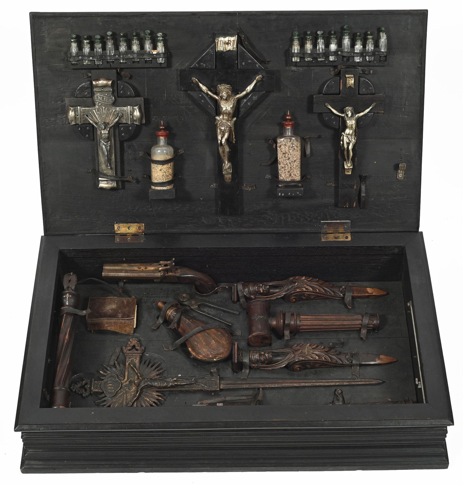 19th Century European Vampire Hunting Kit w/Case.: The Case is Hand-Painted, with a Design of Jesus on the Cross. The Kit Contains Hand-Carved Figural Wood Stakes, Crucifixes, Salt Flasks, Holy Water Bottles, Hatchet and More. The Case Measures 32 1/2