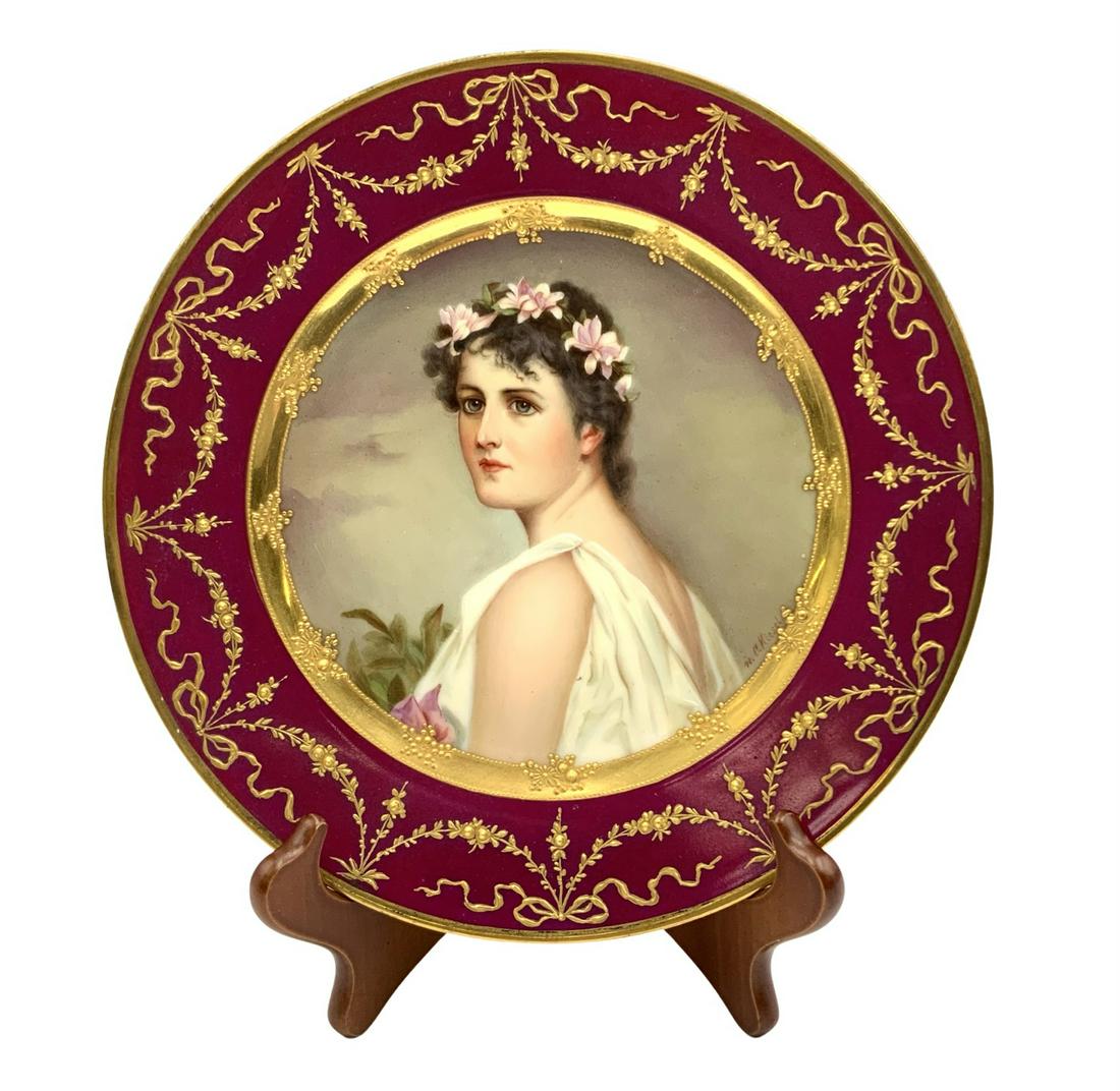 Royal Vienna Lady Portrait Plate w/ Gold Gilt.: Measures 9.5" in diameter, and is in very nice condition. There are some areas of minor gilt loss on the edges. The portrait is signed, "Kiesel". The back of the plate features the Royal Vienna mark u