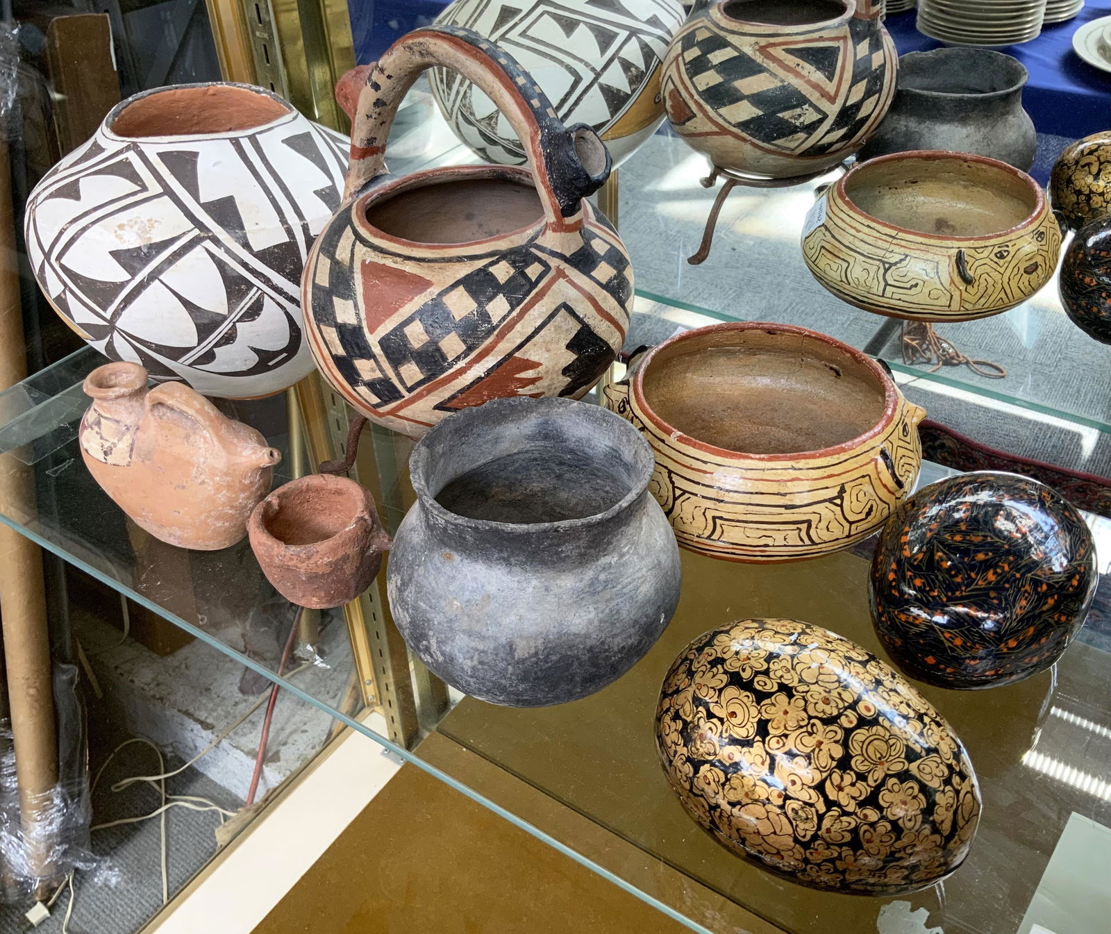 Lot of Assorted Pottery & Decorative Boxes.: The two painted egg-shaped boxes are made in India. The pottery includes some American Indian Pueblo, Acoma, and Pre-Columbian style pieces. The largest item is the black and white 7.5" vase, marked "