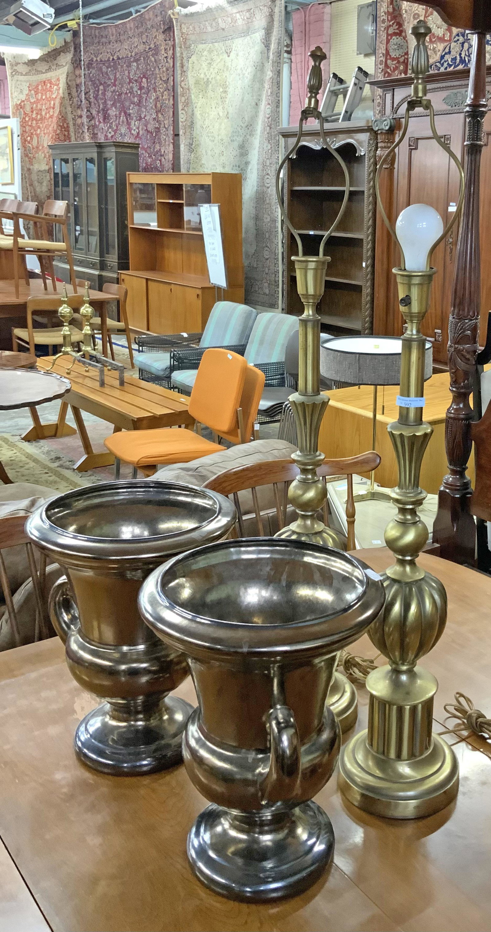 4 Pc Lot: 2 Brass Lamps and 2 Flower Urns.: The lamps are 29" tall and the Urns are 15" tall. Third-Party Shipping or Personal Pickup Required.