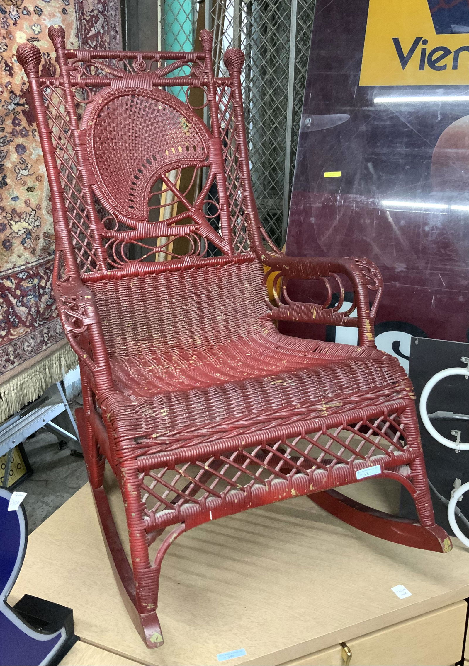Antique Ornate Red Painted Wicker Rocker. (1 of 1)
