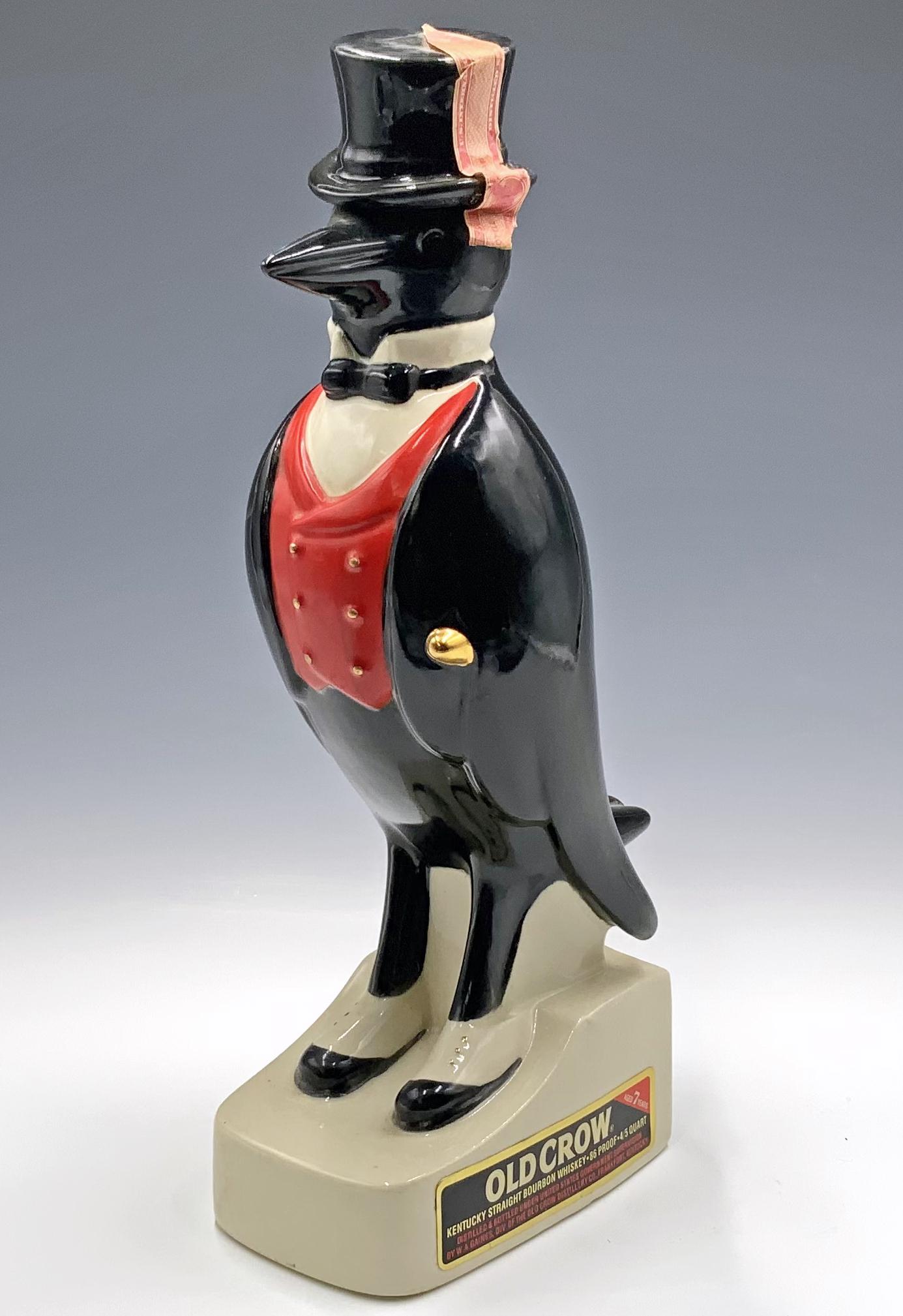 Vintage Old Crow Bottle.: This is an Old Crow bottle, featuring their brand character. It measures 13" tall by 6" deep. It is previously owned and has been opened but is in great condition with the original seal paper still at