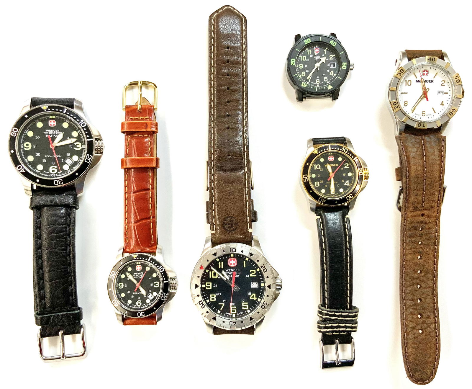 Lot of 6 Swiss Army Watches.: 5 are by Wenger. The Largest Watch Measures 1 11/16" in Diameter. None of these are Currently Running, but they Look Like they are in Good Condition. Most Likely, they just need Batteries.
