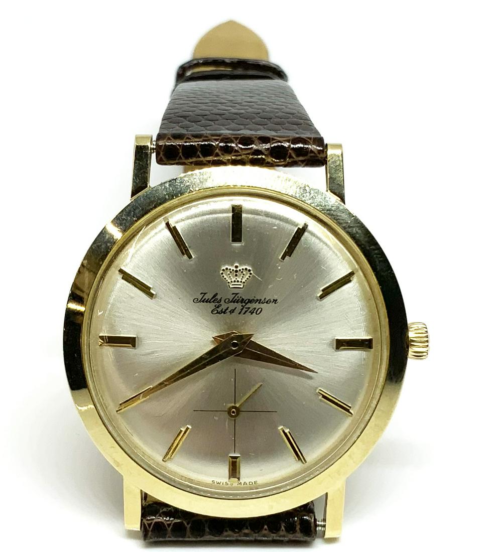 14K Gold Vintage Jules Jurgensen Men's Watch.: The Watch has some Scratches on the Back but is in Very Good Overall Condition. It Ticks. The Watch measures 35mm in Diameter.