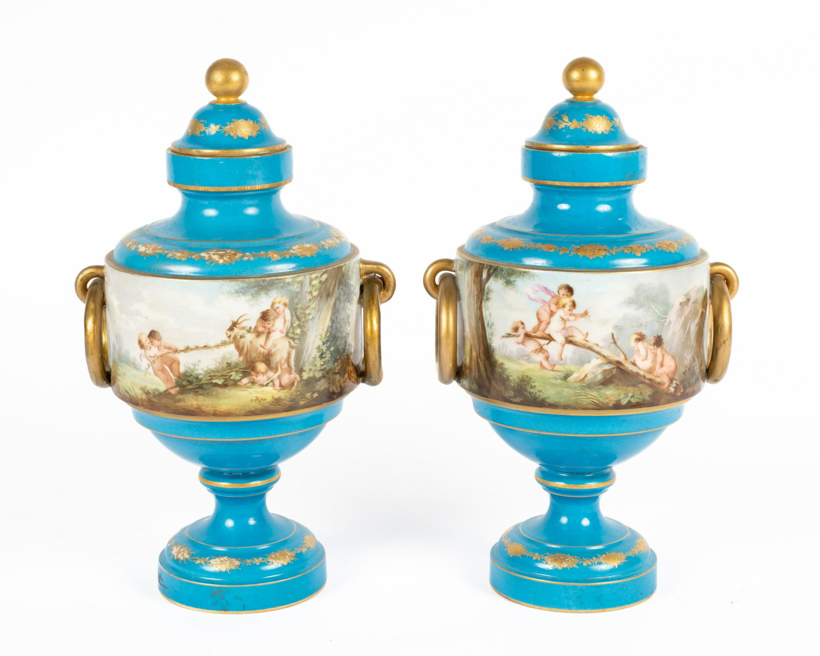 Pair of Old Paris Lidded Urns with Cherub Scenes.: These are Robin's egg blue, with hand-painted scenes. They look to be in Nice condition overall, with a few Smudges and Stains. There is some Gold gilt loss as well. Each measures 16" tall, and 6" in 