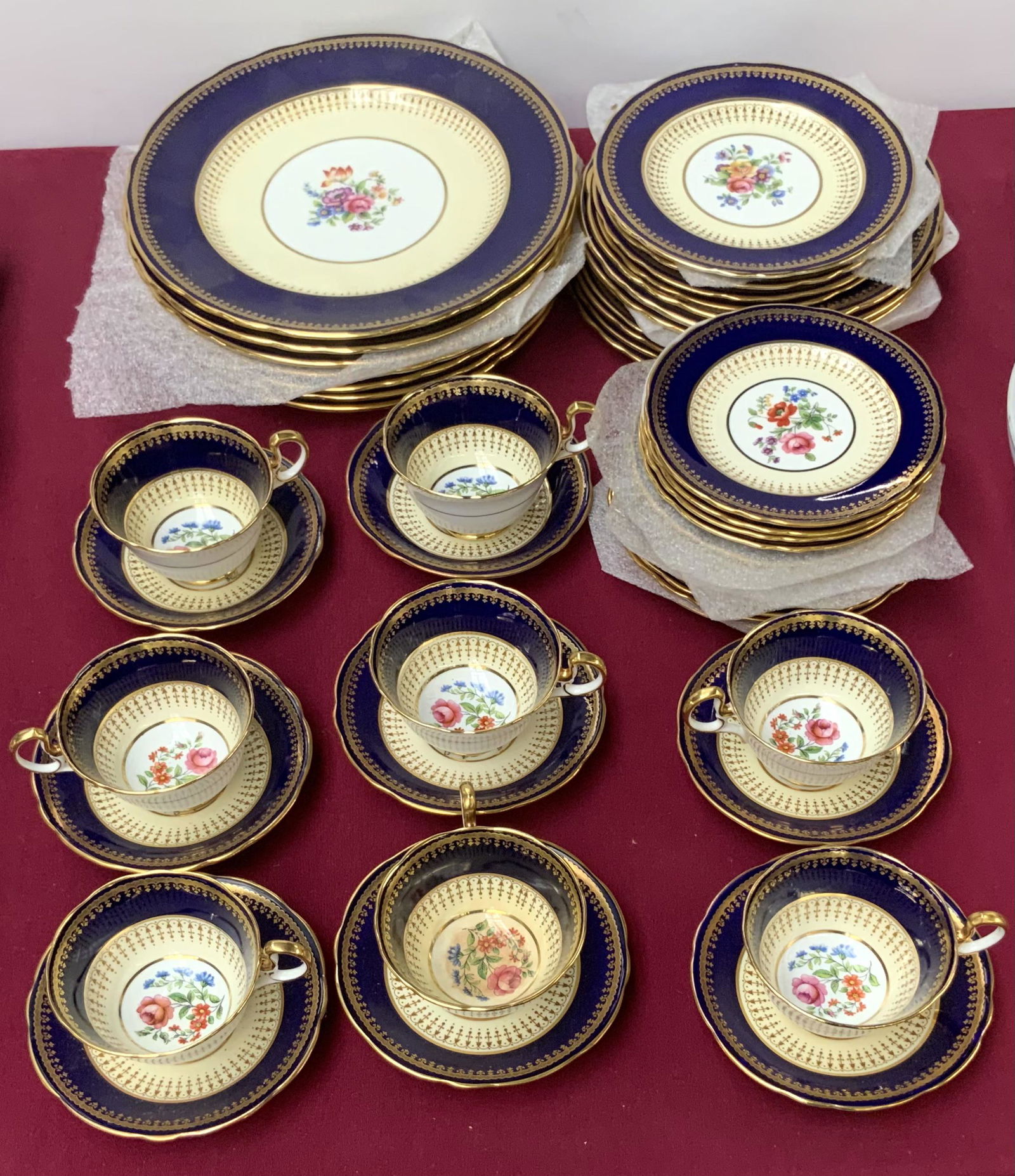 45 Pc. Set of Aynsley Blue & Gold Floral China. (1 of 3)
