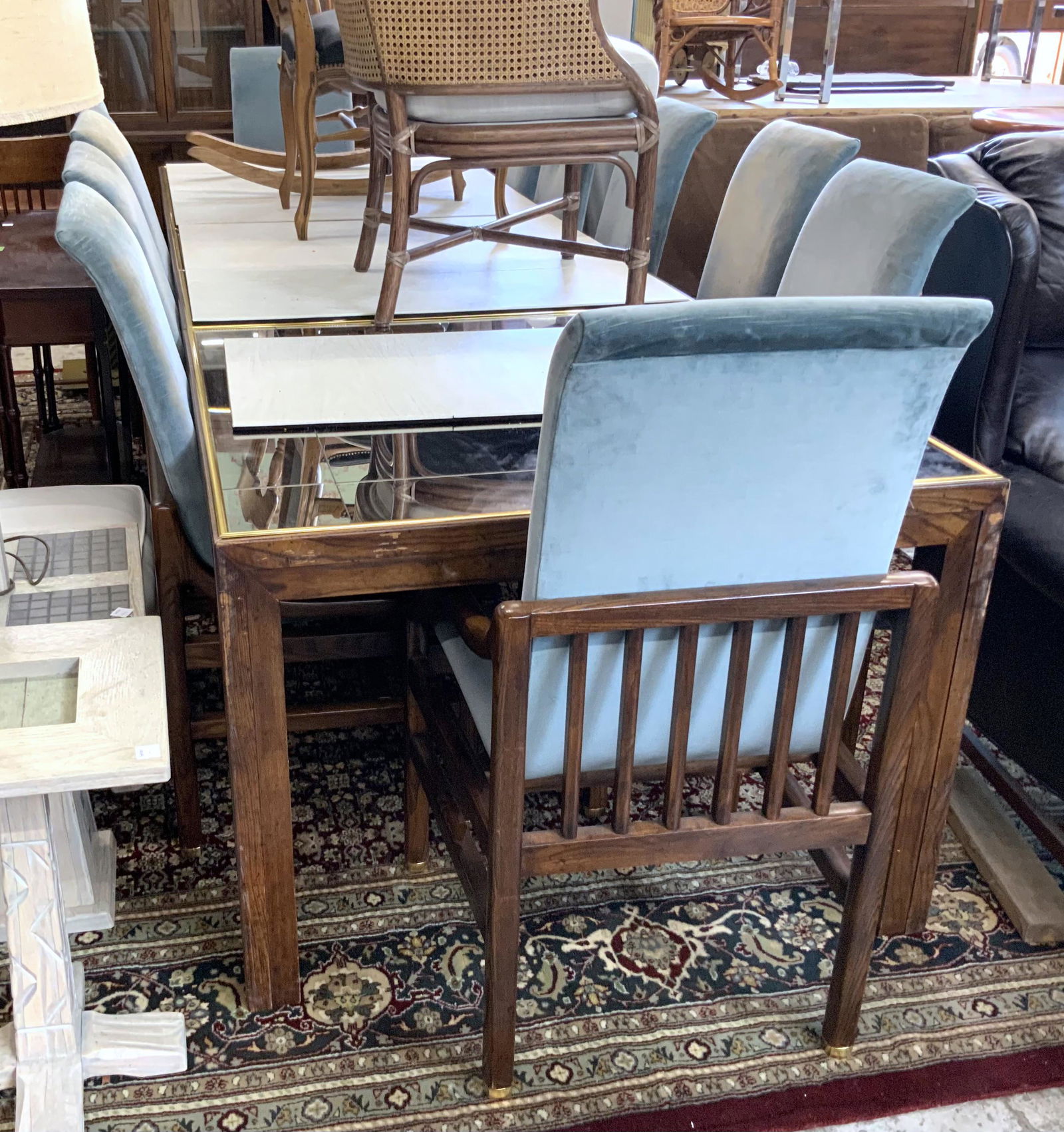 Henredon Mirrored-Top Dining Table and 12 Chairs.: There are Some cracks in the mirrored top. This Long Table has brass trim and a sturdy wood base, with 2 leaves. The chairs are Henredon, and their style number is 27-9100. The fabric shows use, but a