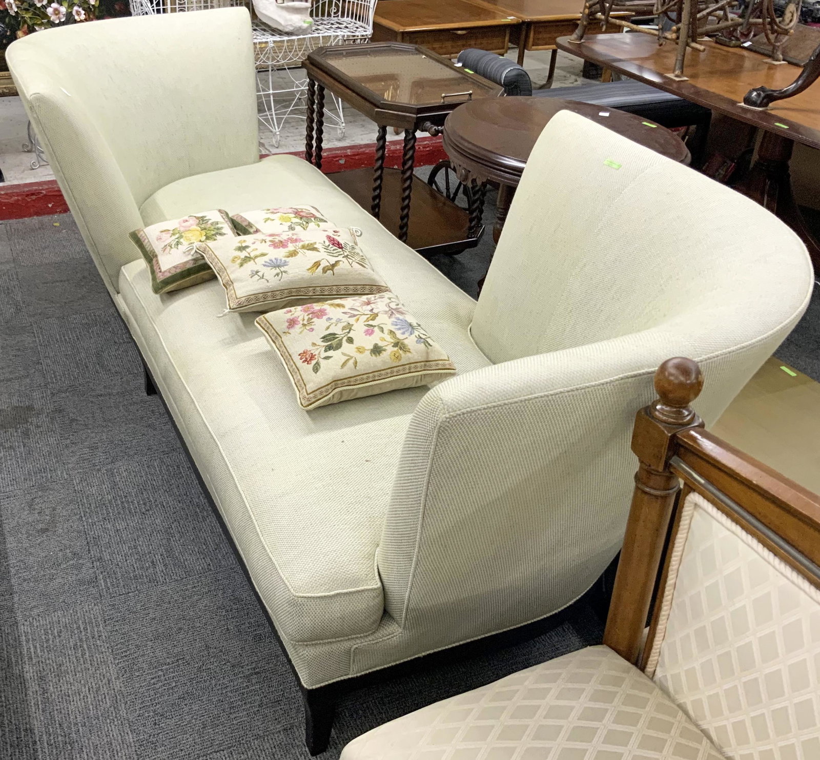 Unusual Double-Ended Conversation Sofa.: Done in a Beige lightly textured fabric, this sofa is in Good Overall Condition, with No damage to the frame, and no stains, rips or tears to the fabric. It Measures 100" long, 38" wide and 33" tall. 
