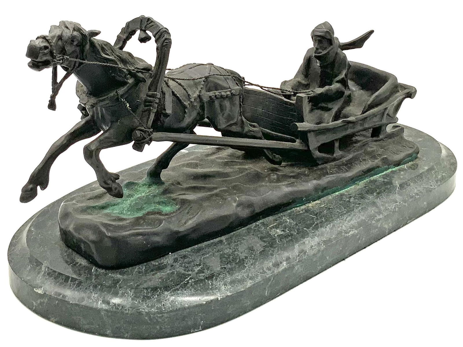 Bronze Sculpture of Horse Pulling Man In Sled. (1 of 3)