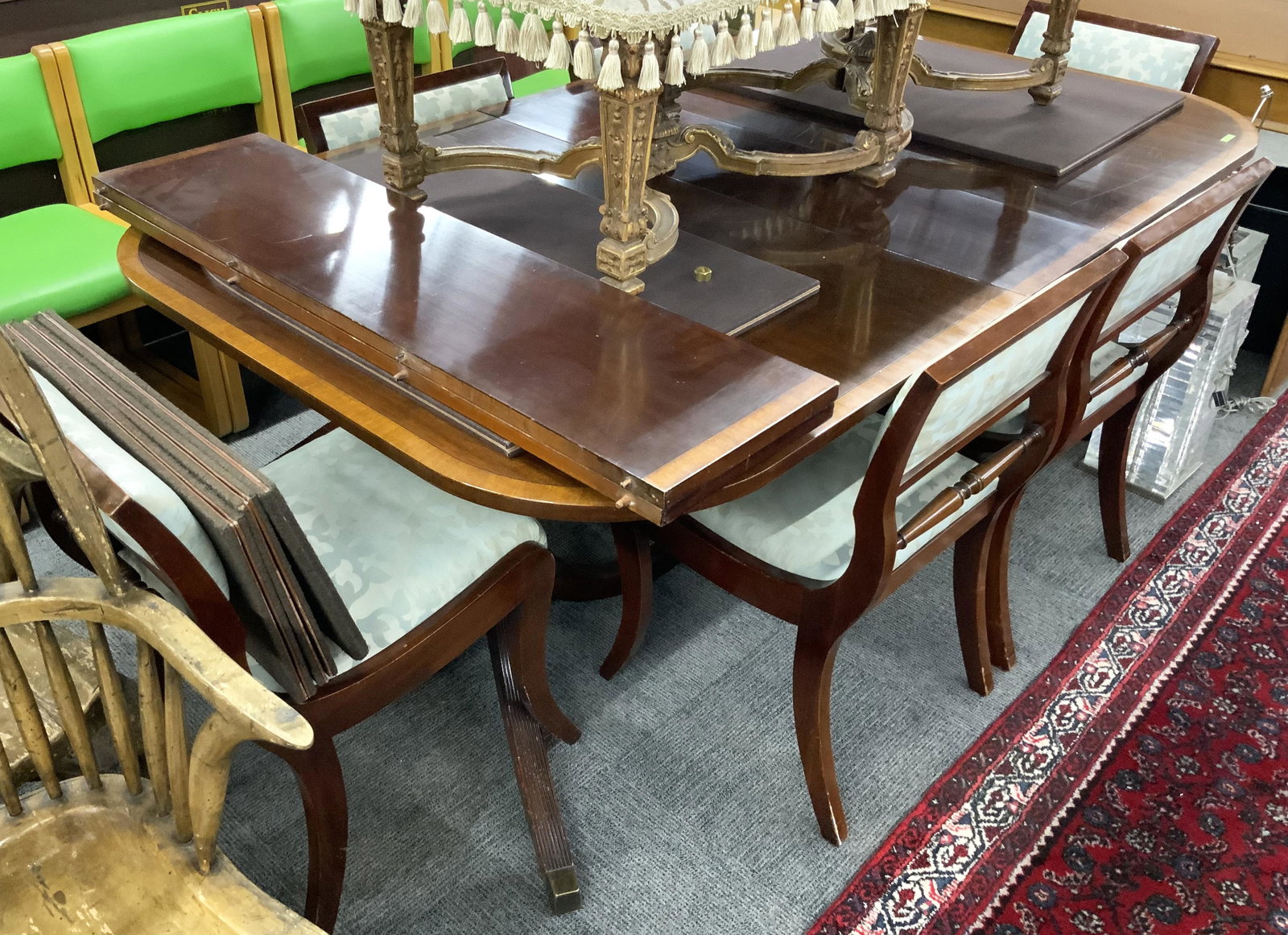 Mahogany Dining Table, 6 Chairs and 3 Leaves.: This complete Duncan Phyfe Dining Room Set has a banded inlaid table, Three 11" wide matching banded leaves, and 6 Saber-leg chairs with upholstered backs and seats. All are in Good Functional Conditi