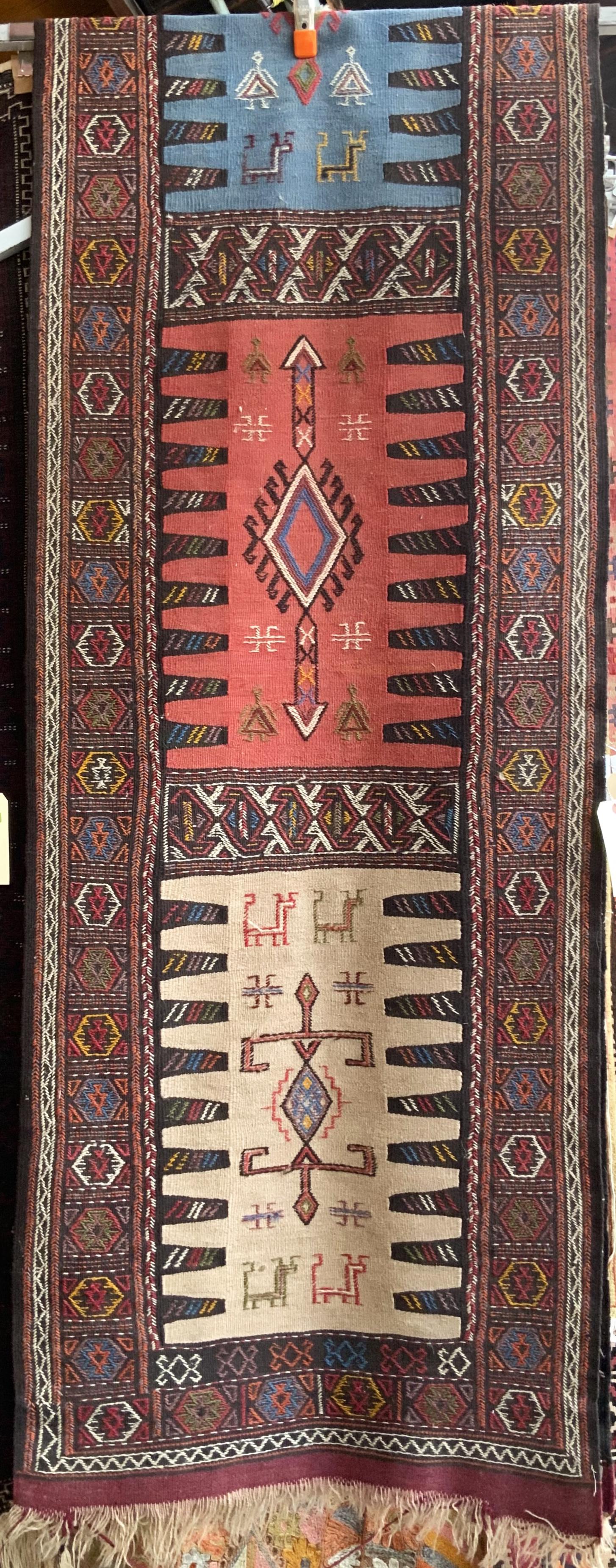 12' 9" by 2' 6" Flatweave Oriental Runner Rug.: This rug has faded pink, blue and beige colors in the field. It appears to be in Good Condition. In-House Shipping is Available for this Rug.