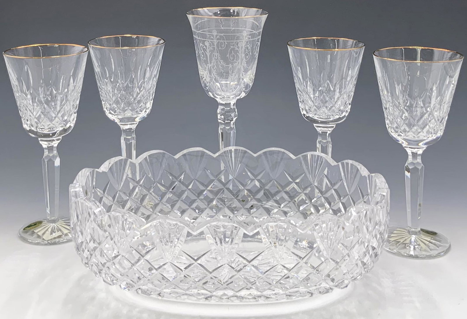 Lot of Waterford Crystal Items: Stemware, Bowl.: Includes four Golden Carina wine glasses, with the Original Box. They appear to be New or Like New. The other wine goblet has the Charlemont etched pattern, and is also in Very Nice condition. The bow