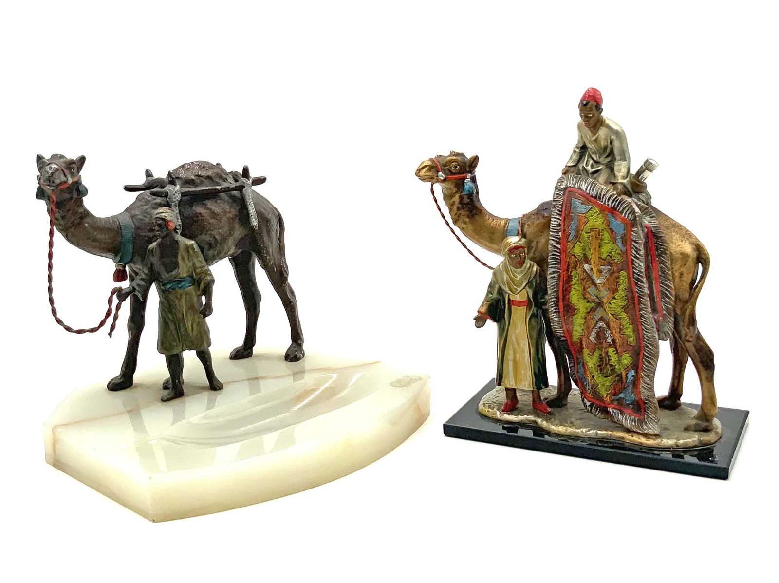 Lot of 2 Camel w/ Rider Smoking Accesories.: One is a lighter and the other is an ashtray. They resemble Cold-Painted Bronze, but the Ashtray is Spelter, and the Lighter is Possibly a Composition material. The Lighter is Untested. It is the tall