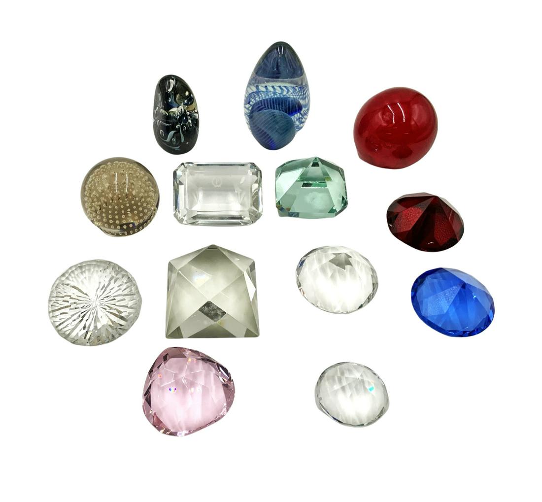 Lot of Asst. Glass Paperweights, Some Signed.: Includes Robert Eickholt, Oleg Cassini, Ron Schuster. Many of the other paperweights are prismatic. They are in Nice condition overall, but some have small Chips. The tallest paperweight is the Eickho