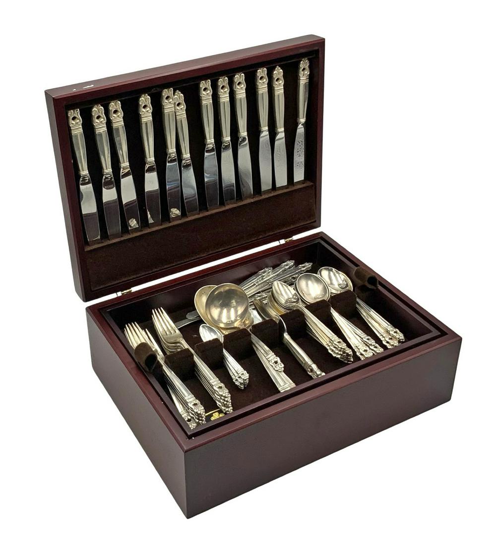 77 Pc. Set- Royal Danish Acorn Sterling Silverware: Made by International Silver. The Set Includes 13 Soup Spoons, 12 Teaspoons, 12 Dinner Forks, 11 Demitasse Spoons, 12 Dinner Knives, 12 Butter Knives, and 5 Serving Pieces. The Set looks to be in over