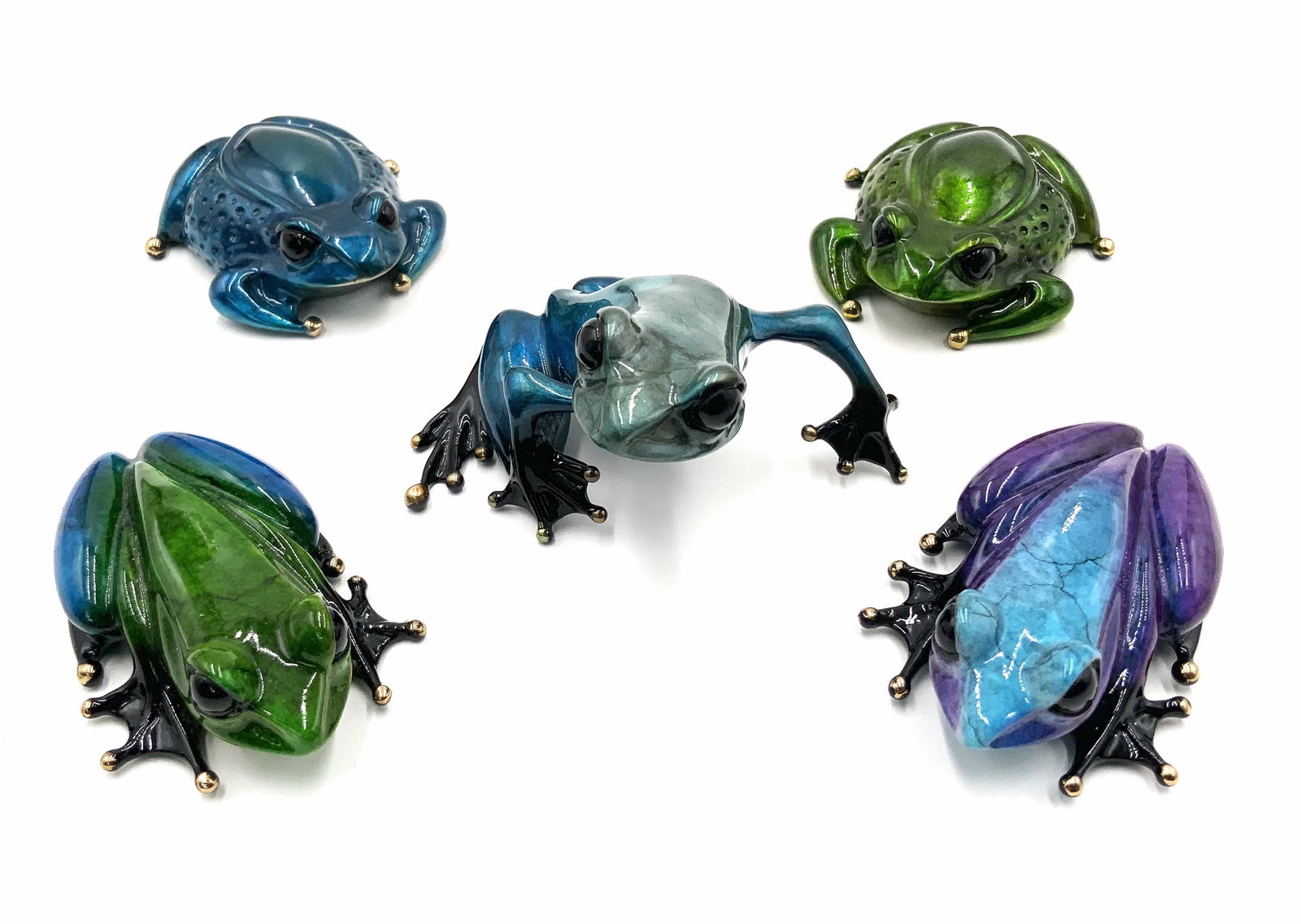 Tim Cotterill Lot: 5 Small Bronze Frogs.: All are Signed and Numbered. Two of them actually resemble little toads. There is some enamel loss along the edges of the blue toad's mouth. The "Gem" frog has some enamel loss on its left hand, as we