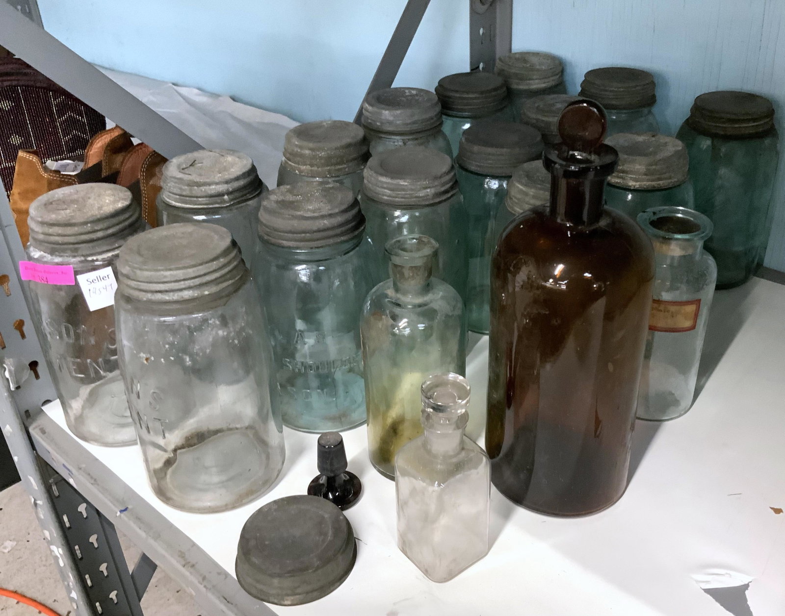 Lot of Antique Mason Jars & Apothecary Bottles.: The tallest one is 11 1/2". They are in Fair condition overall; a number of the lids have corrosion and dirt. Third-Party Shipping or Personal Pickup Required.