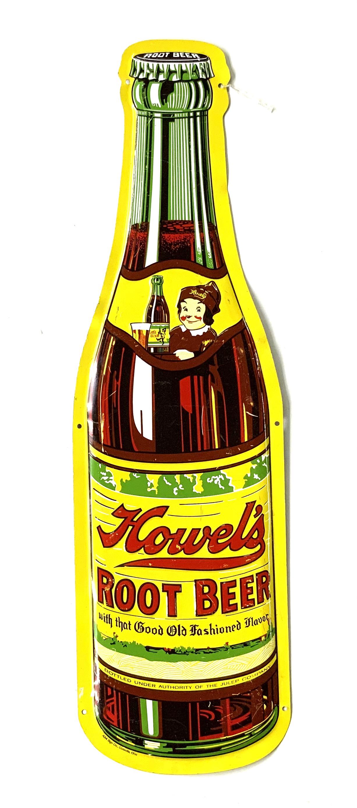 Howel's Root Beer Metal Die-Cut Advertising Sign.: The Sign is Shaped like a giant soda bottle. It Reads, "Howel's Root Beer- with that Good Old Fashioned Flavor", and under that, "Bottled under authority of the Julep Company". It is Made by the AAA S