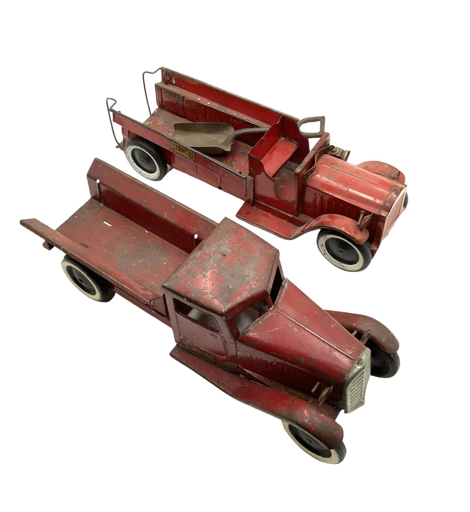 Lot of 2 Vintage Structo Red Toy Trucks.: They are in Rough shape, but are still useable. Also included is a small metal Shovel. The Larger truck measures 19 1/4" long, 6" wide, and 6" tall. They are Moderately Heavy pieces. Third-Party Shipp