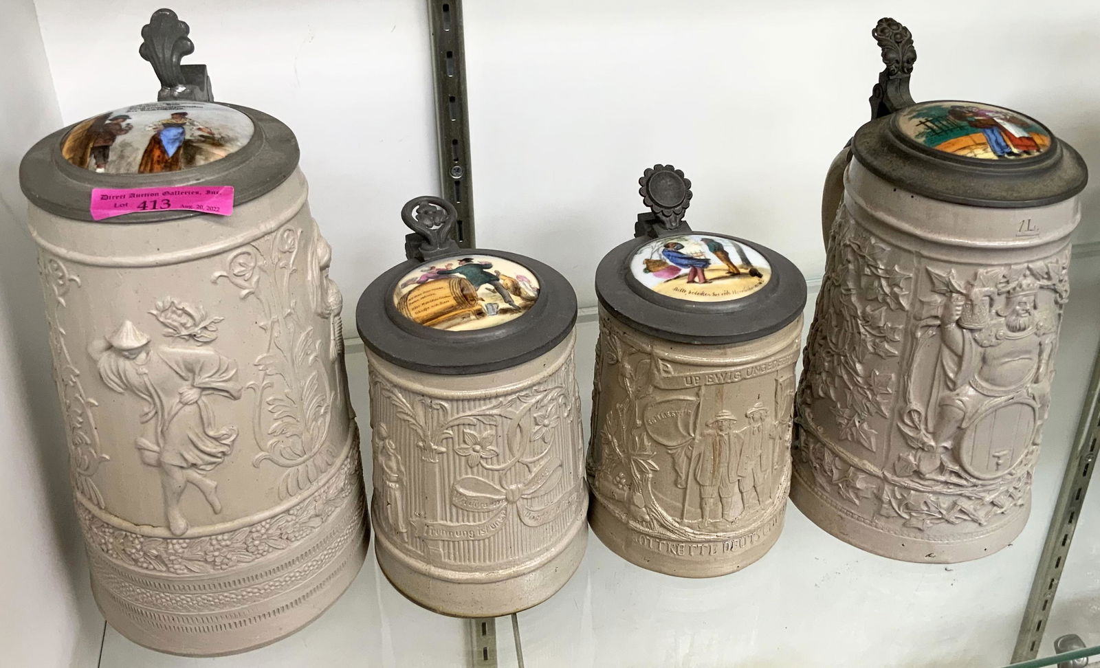 Lot of 4 Gray Stoneware Steins w/ Painted Lids. (1 of 2)