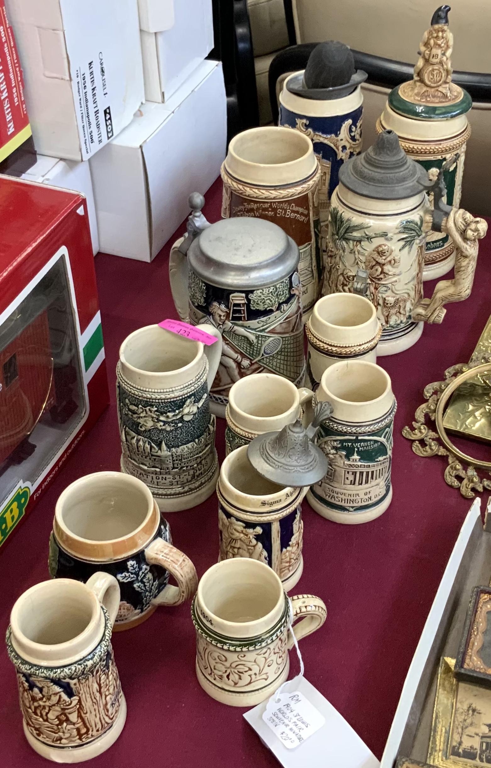 Lot of 13 German Steins- Various Sizes. (1 of 1)