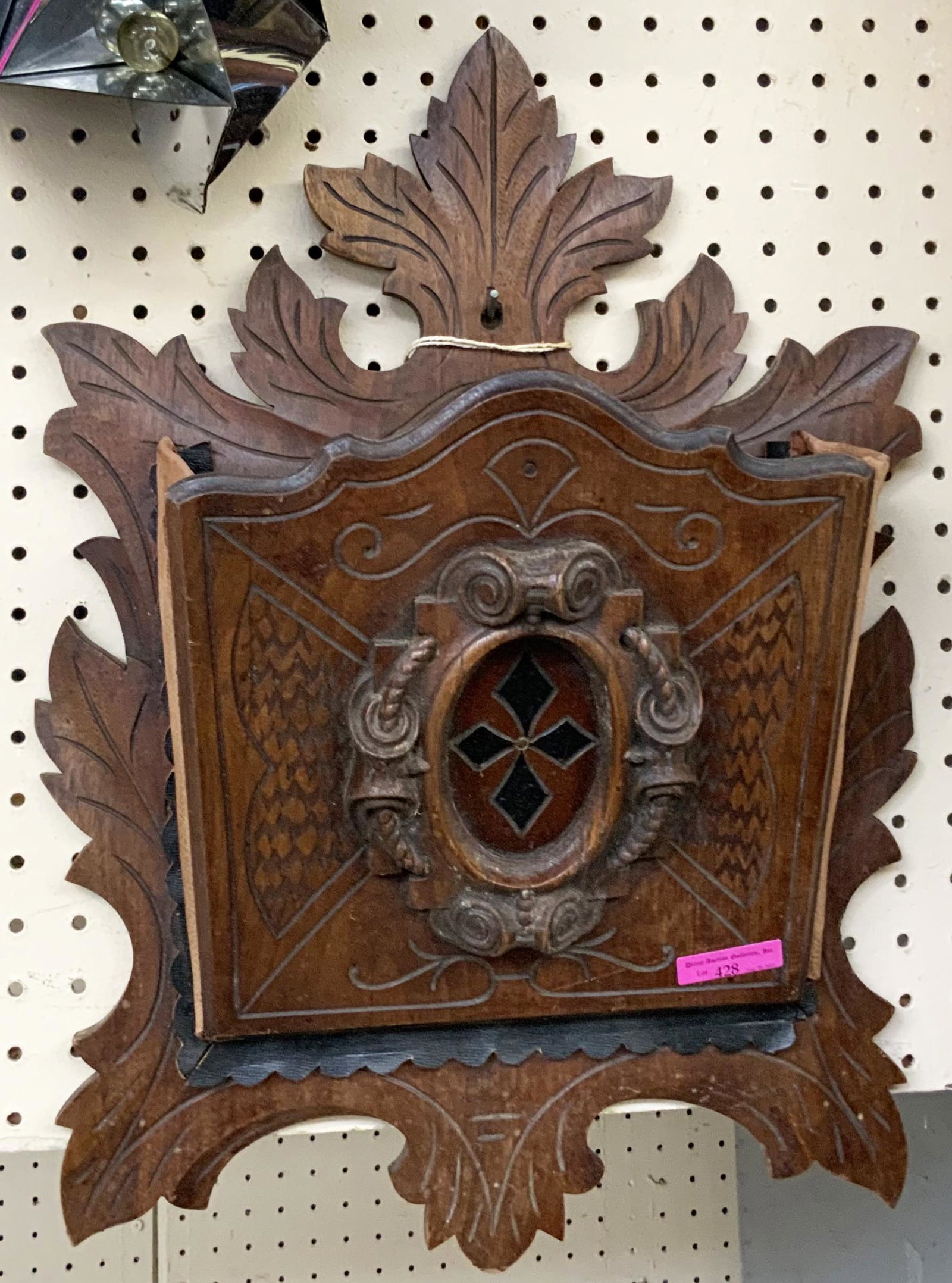 Black Forest Carved Wood and Leather Wall Pocket.: The Antique Wall Pocket or letter holder Looks to be in Nice condition. It Measures 21" x 15", with the pocket opening 4" at its maximum point. Third-Party Shipping or Personal Pickup Required.
