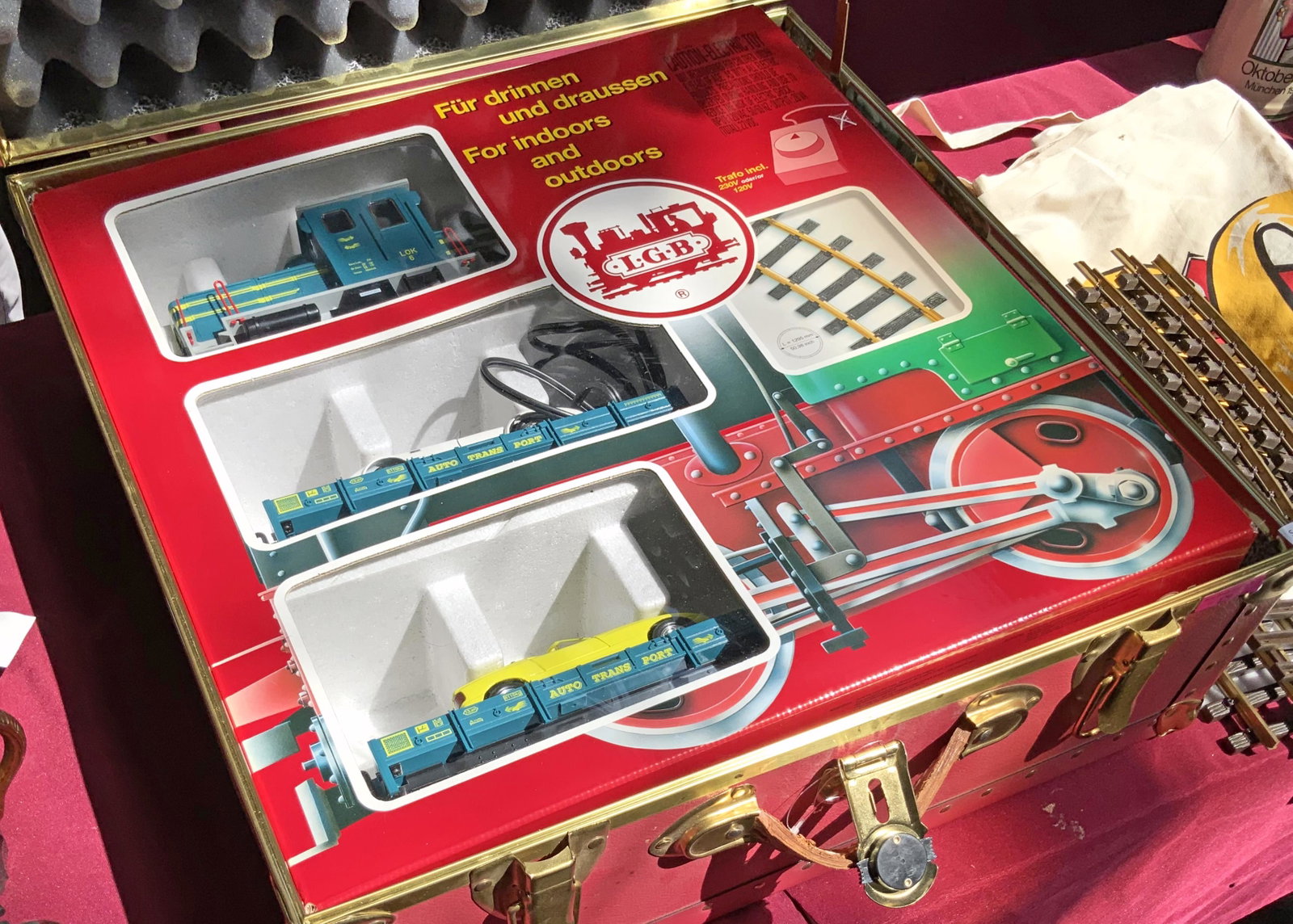 LGB Auto Transport Train Set w/ Travel Trunk.: The Train Set comes with the Original Box. Also included are some additional tracks, and a large LGB canvas tote bag. The trunk is quite large, measuring 23 3/4" x 23 1/4" x 10". It is marked as a Lim