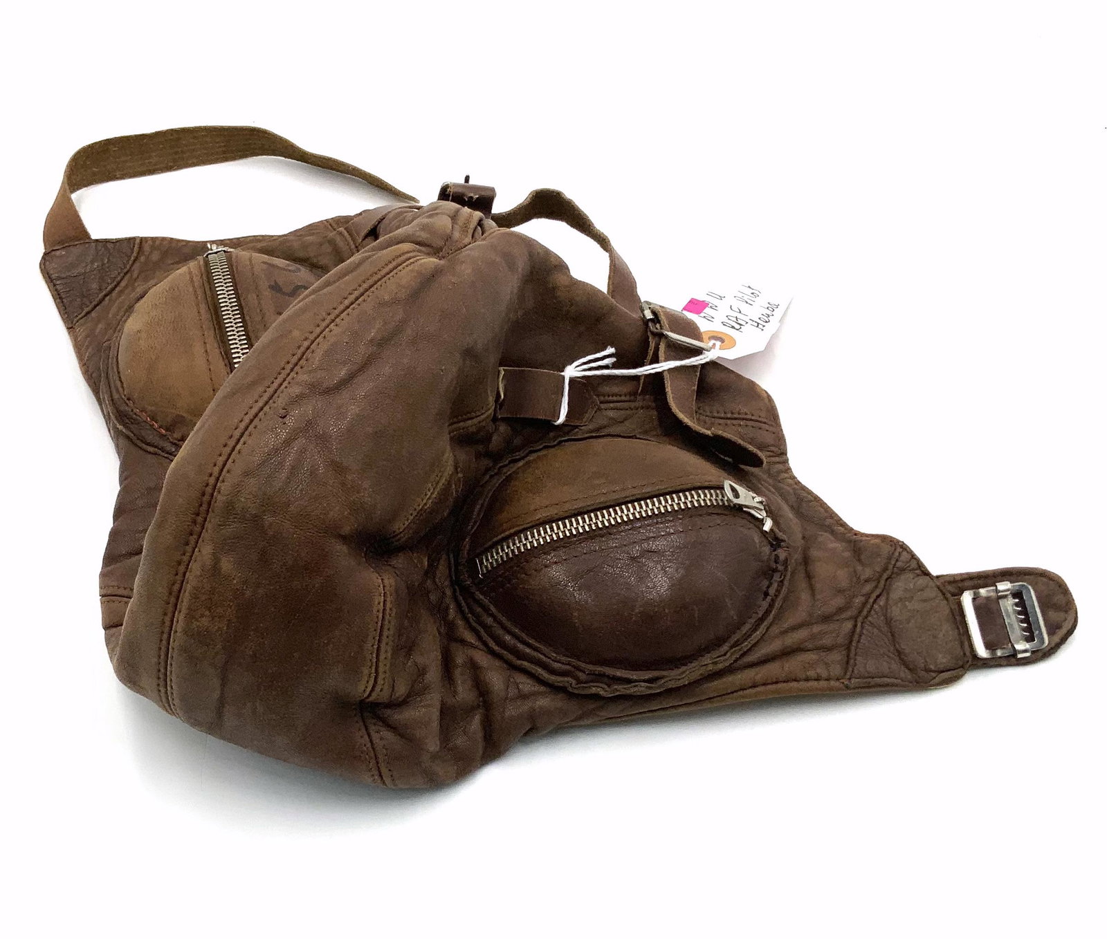 WWII Leather RCAF Flight Helmet/ Pilot's Hat.: For the Royal Canadian Air Force. Straps and zippers appear to be fully Functional. The Helmet looks to be in Nice condition. Size is Small.