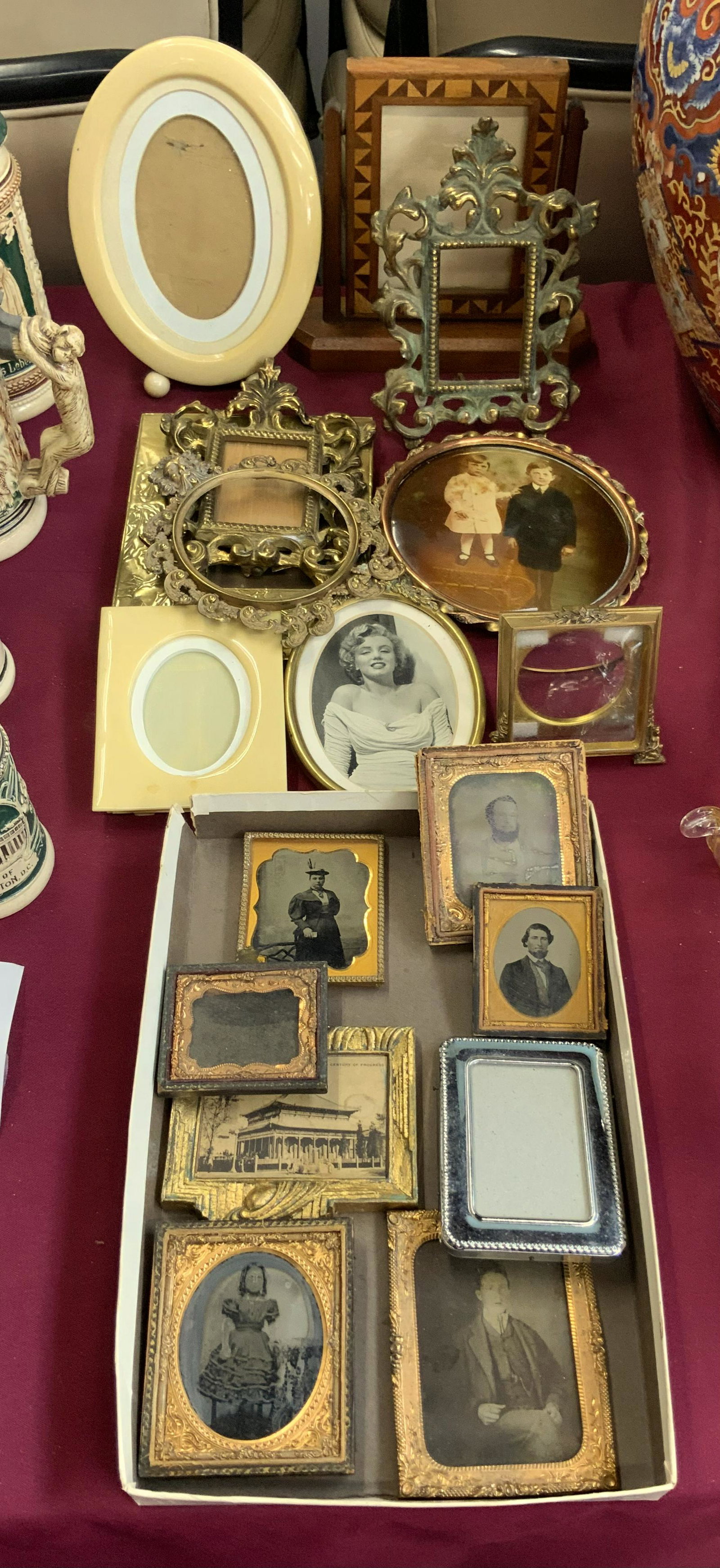Lot of Mostly Antique Picture Frames & Photos.: Some still have pictures in them. Some are Tintypes, wood frames, celluloid, etc. The largest one measures 7 1/2" x 6 1/2". Some are more ornate than others. Condition varies. Third-Party Shipping or 