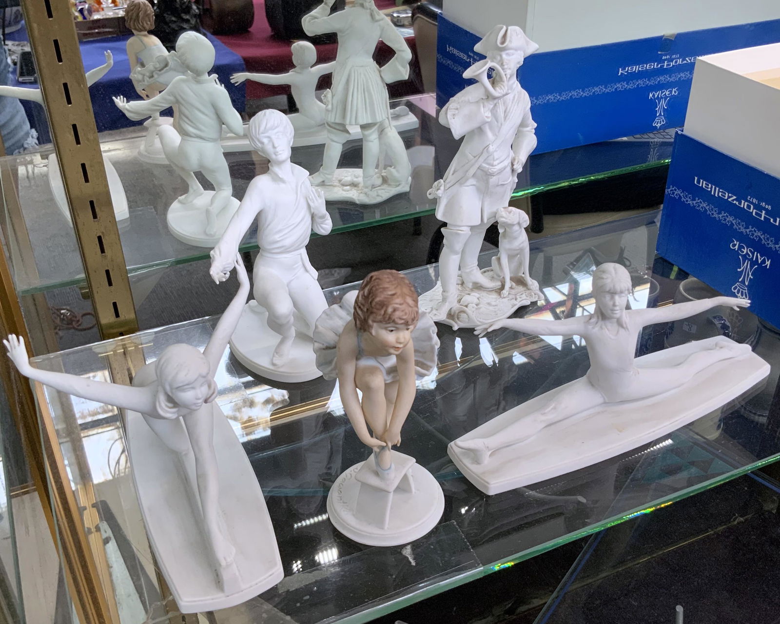 Lot of 5 Kaiser Porcelain Figurines, Mostly White.: Includes gymnasts, ballet dancers, and a Colonial youth with his dog. They could benefit from a cleaning, but look to be in overall Good condition. The largest one measures 8 1/2" long. Third-Party Sh