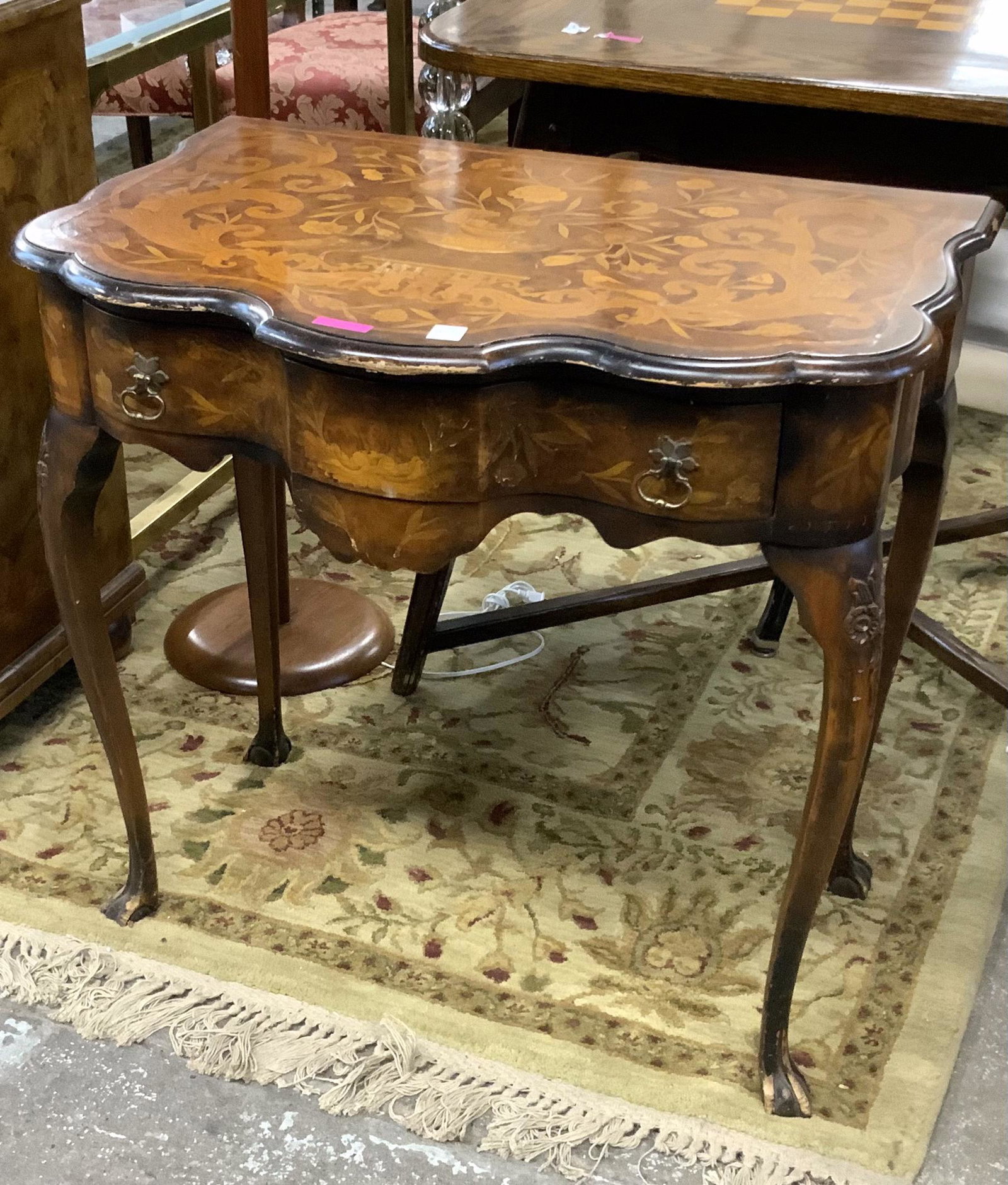 Ornate Clawfoot Marquetry Inlaid Vanity Table.: This petite-size vanity has carved decoration on the front legs, and a drawer. The inlay is on the top as well as the drawer front and the sides. As for Condition, the carved feet and the front edge w