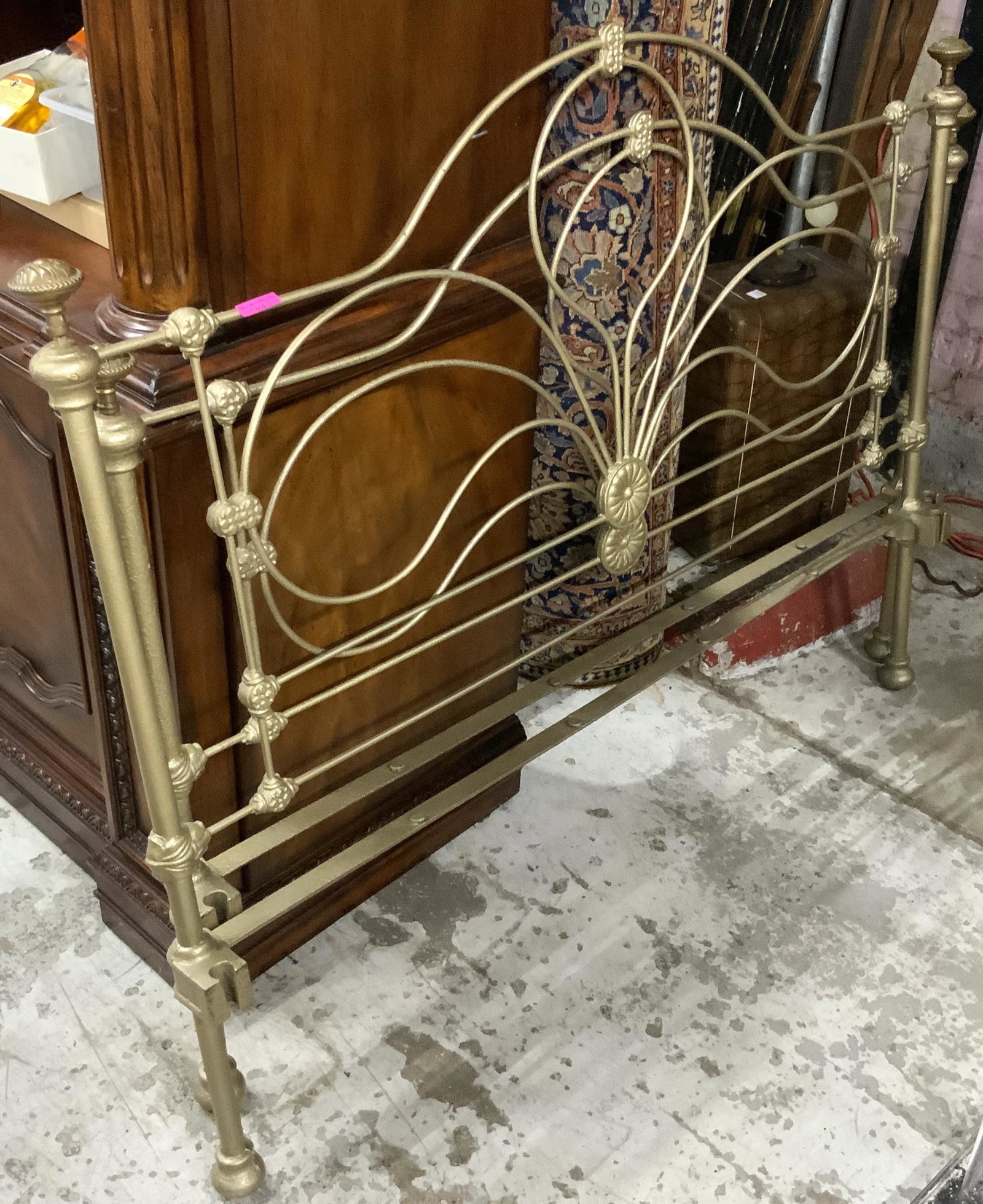 Antique Wrought Iron Bed, Full-Size With Rails.: This bed appears to be intact and in decent condition. Doorknobs have been added to the posts as finials, and It has a bronze-painted finish. It Measures 54" wide by 43" tall. Third-Party Freight Ship