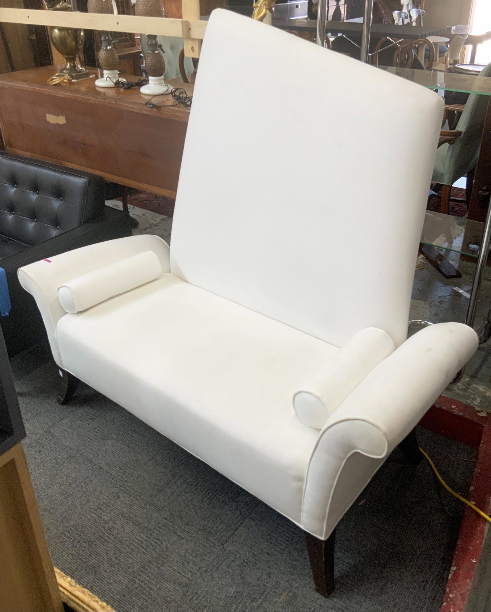 Artistic Design High-Back White Sofa.: This unusual Sofa is in good overall condition, but may need a cleaning. It Measures: 65" wide, 24" deep, and 60" tall at its highest point. Third Party Freight Shipping or Personal Pickup Required.