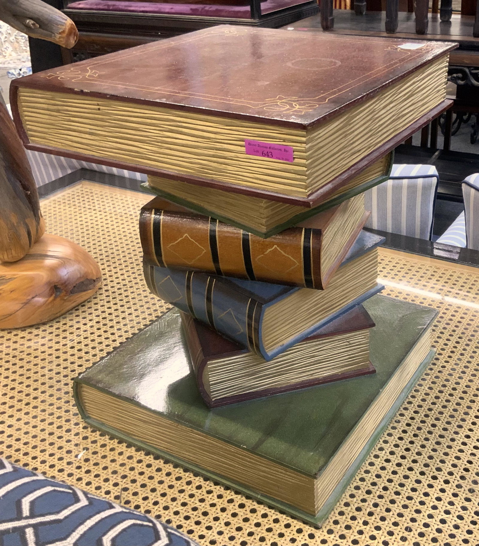 "Stack of Books" Table or Pedestal.: Two large and 4 small book make up the shape of this pedestal. The Table has a Glossy finish overall, with one water ring on the top. It Measures 13" wide and 16" tall. Third Party Freight Shipping or