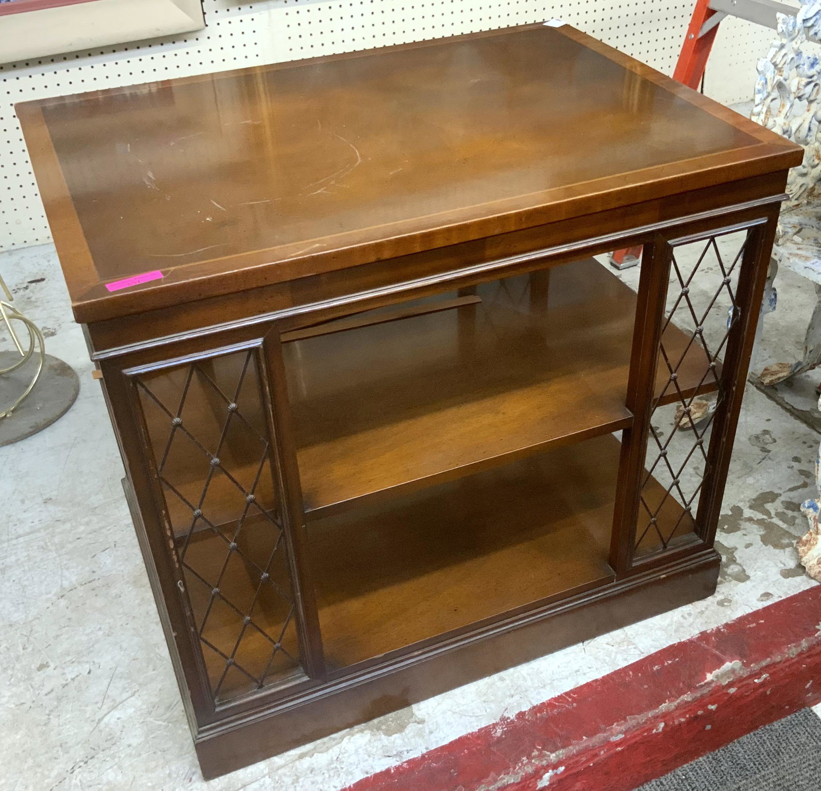 Mahogany Lamp Table with 2 Shelves Below, As Is.: This table has strips of veneer off of the edges in Two places, and will need regluing in order to stabilize the frame.The finish is scuffed on the top, and there are nicks on the Table frame. Third P