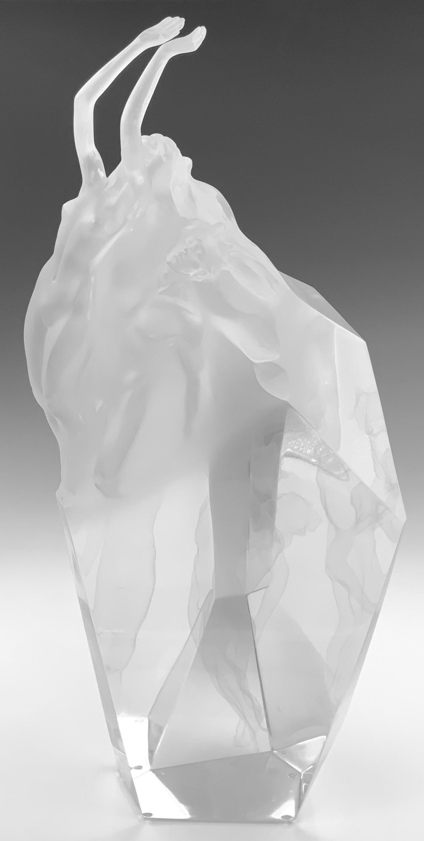 Frederick Hart "Spirit of Victory" Sculpture.: A Limited Edition Sculpture, numbered 140/400. It is Signed by the artist, and dated 1991. The Sculpture is Made of Lucite, with the exterior portraying a male and female reaching for heaven. The inte